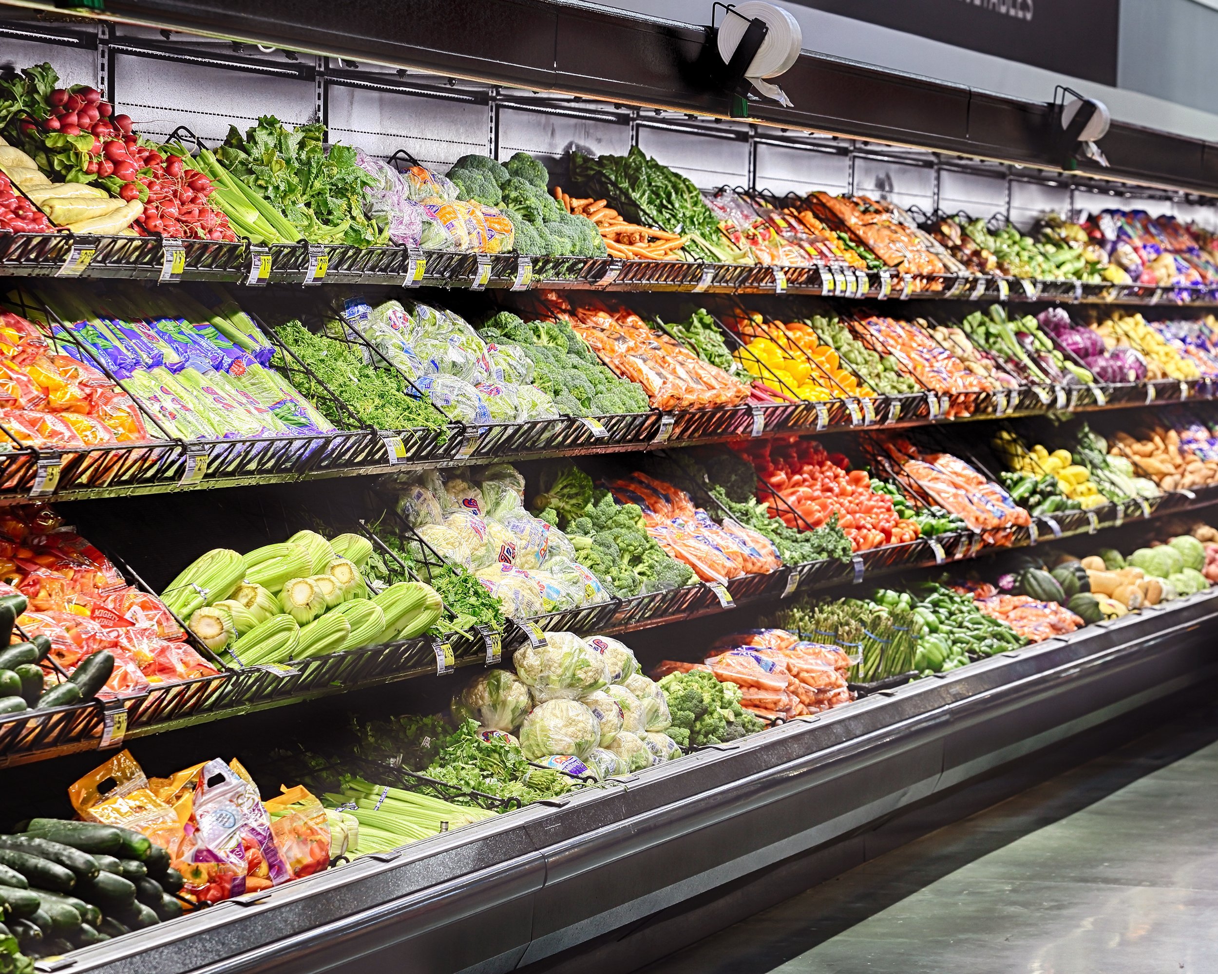 produce section in an interior image of a modern grocery store