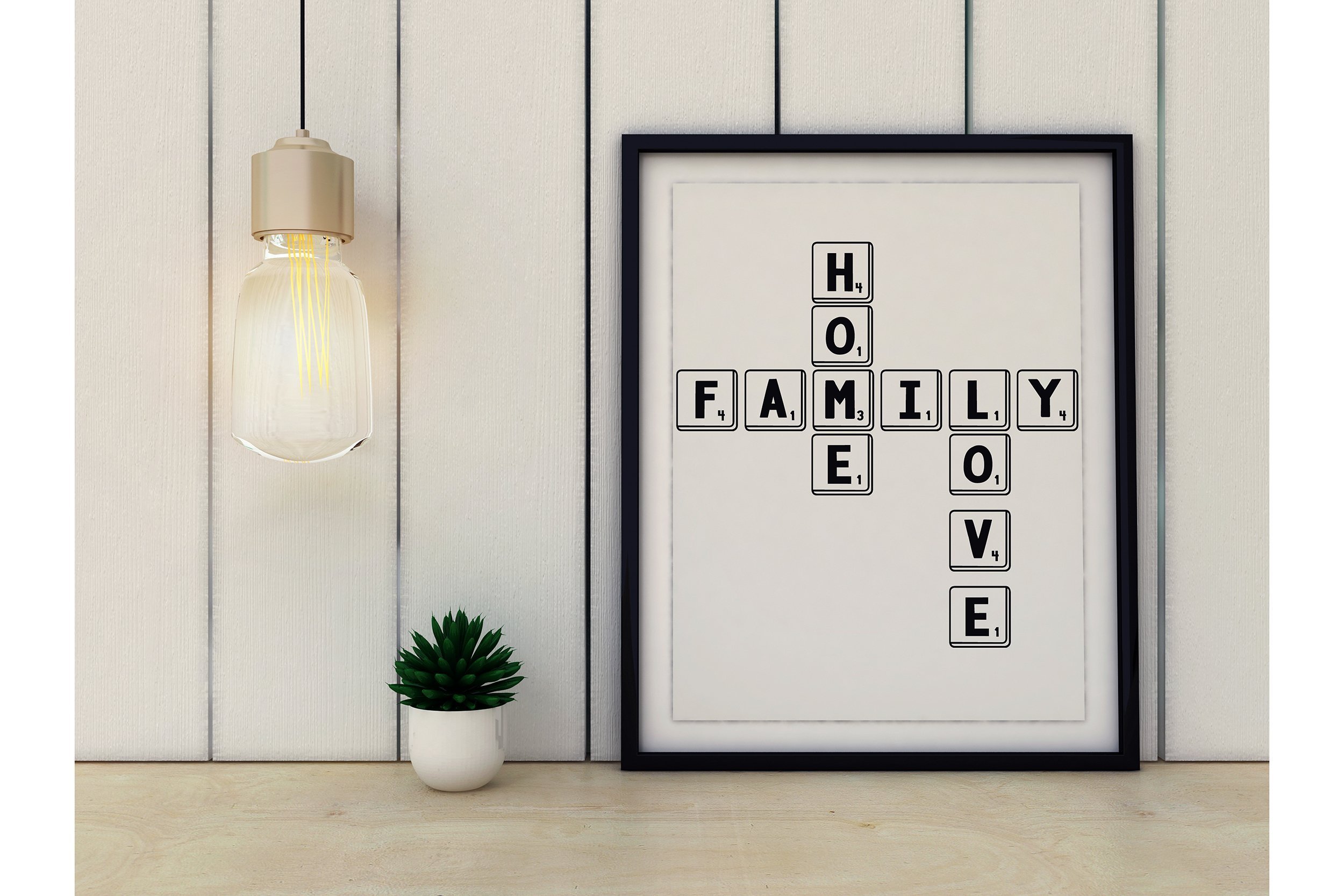 Closeup of frame with home, love, and family graphic