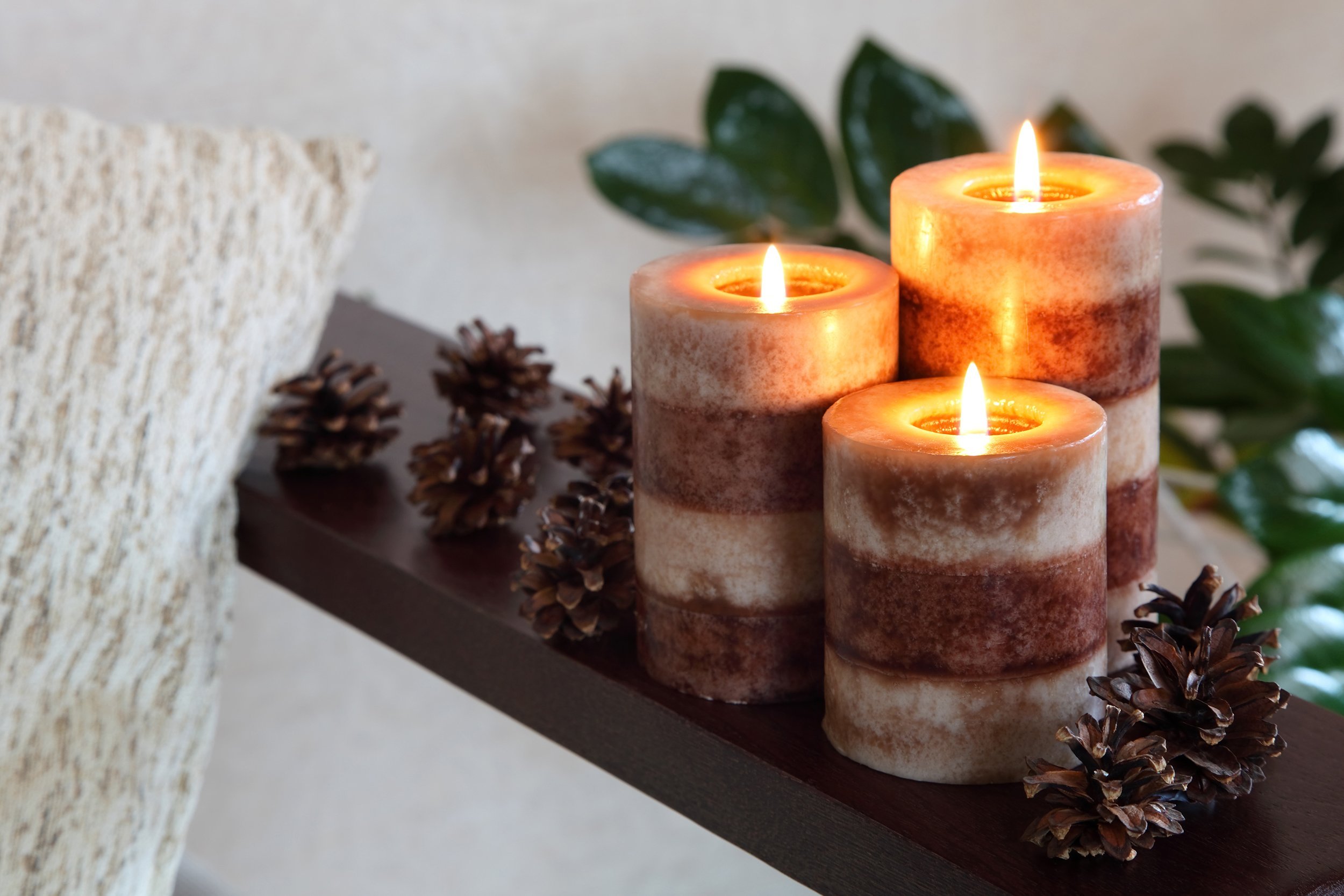 lit candles in living room of home