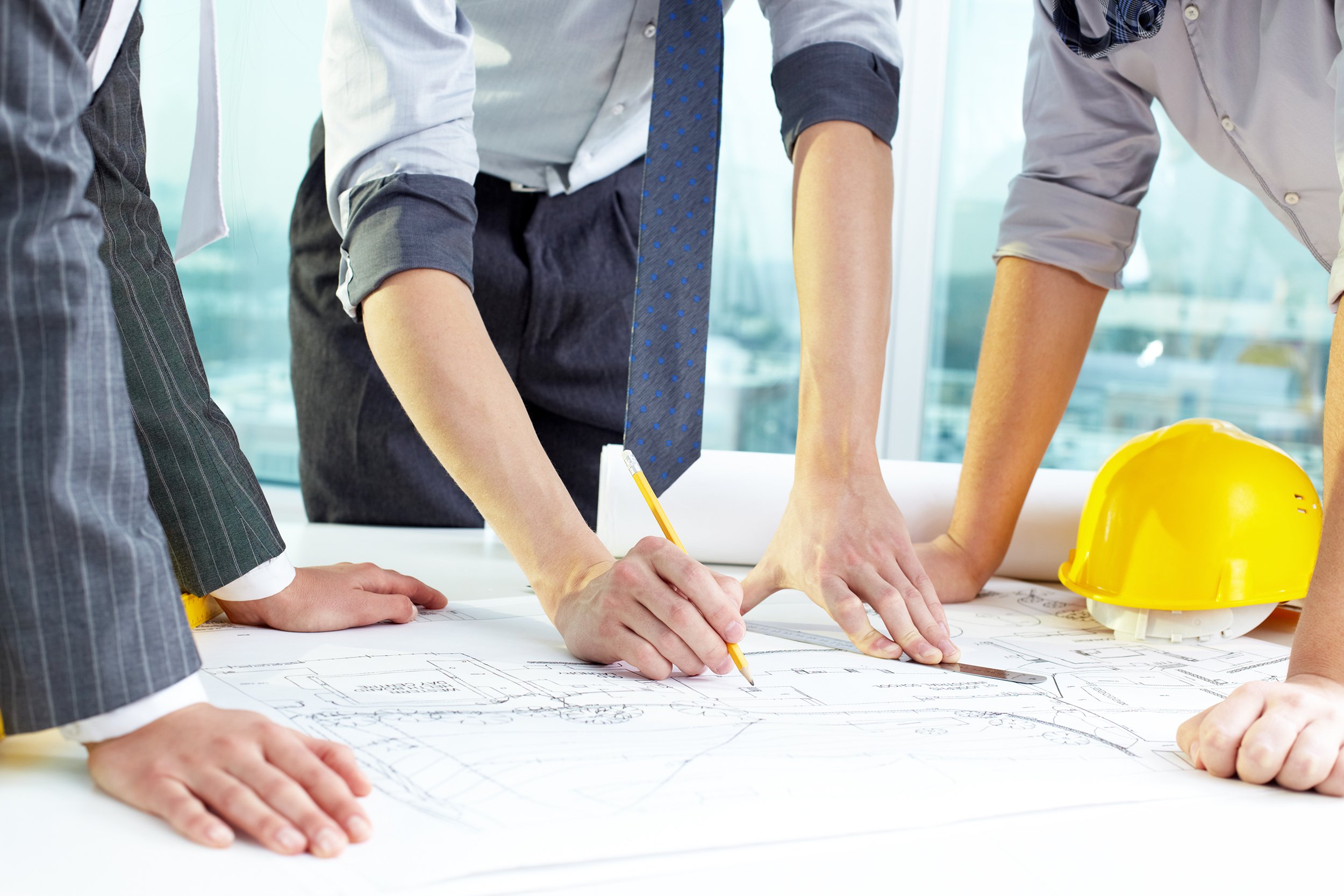 Group of business people working on a housing construction project