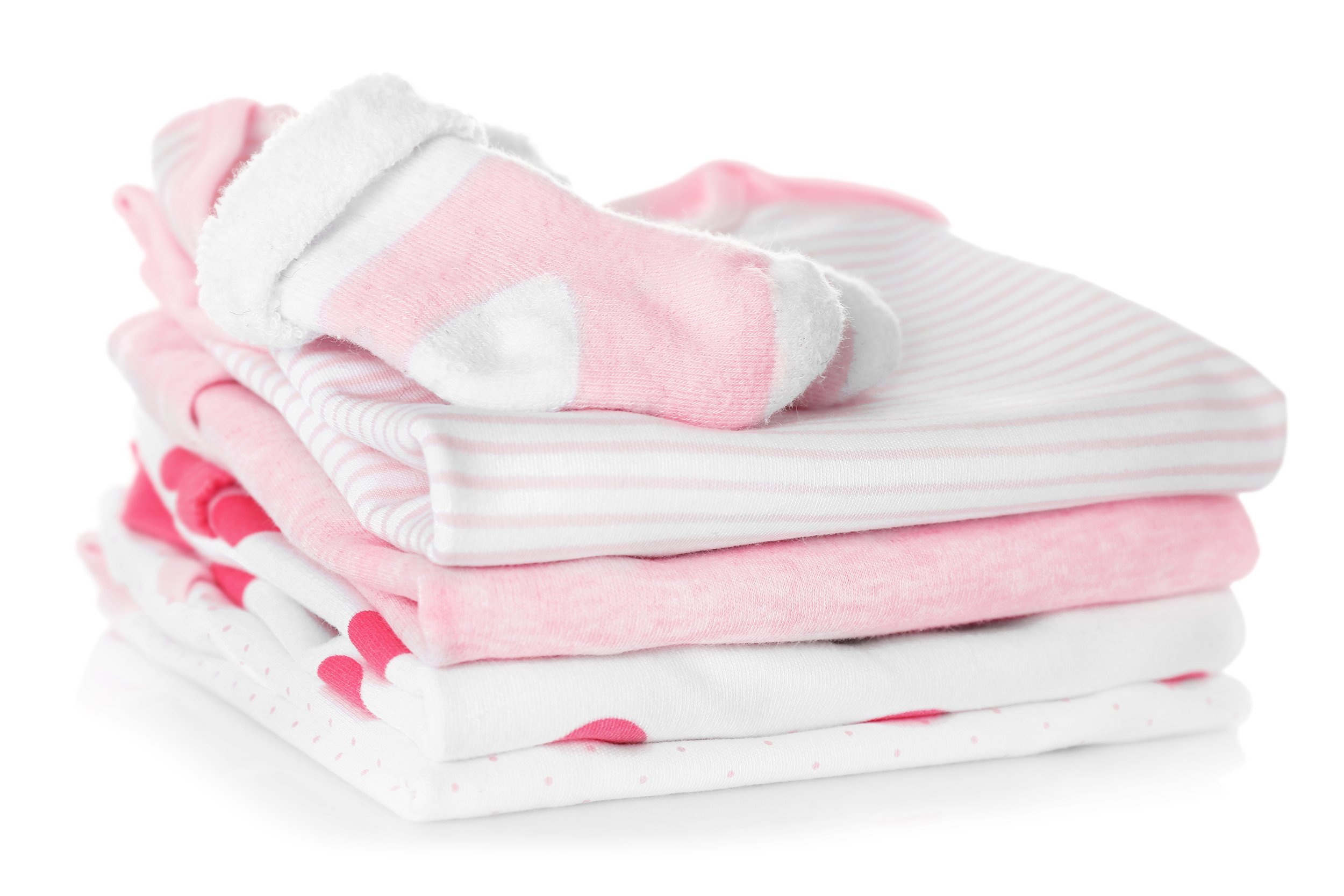 baby shoes and pile of clothes