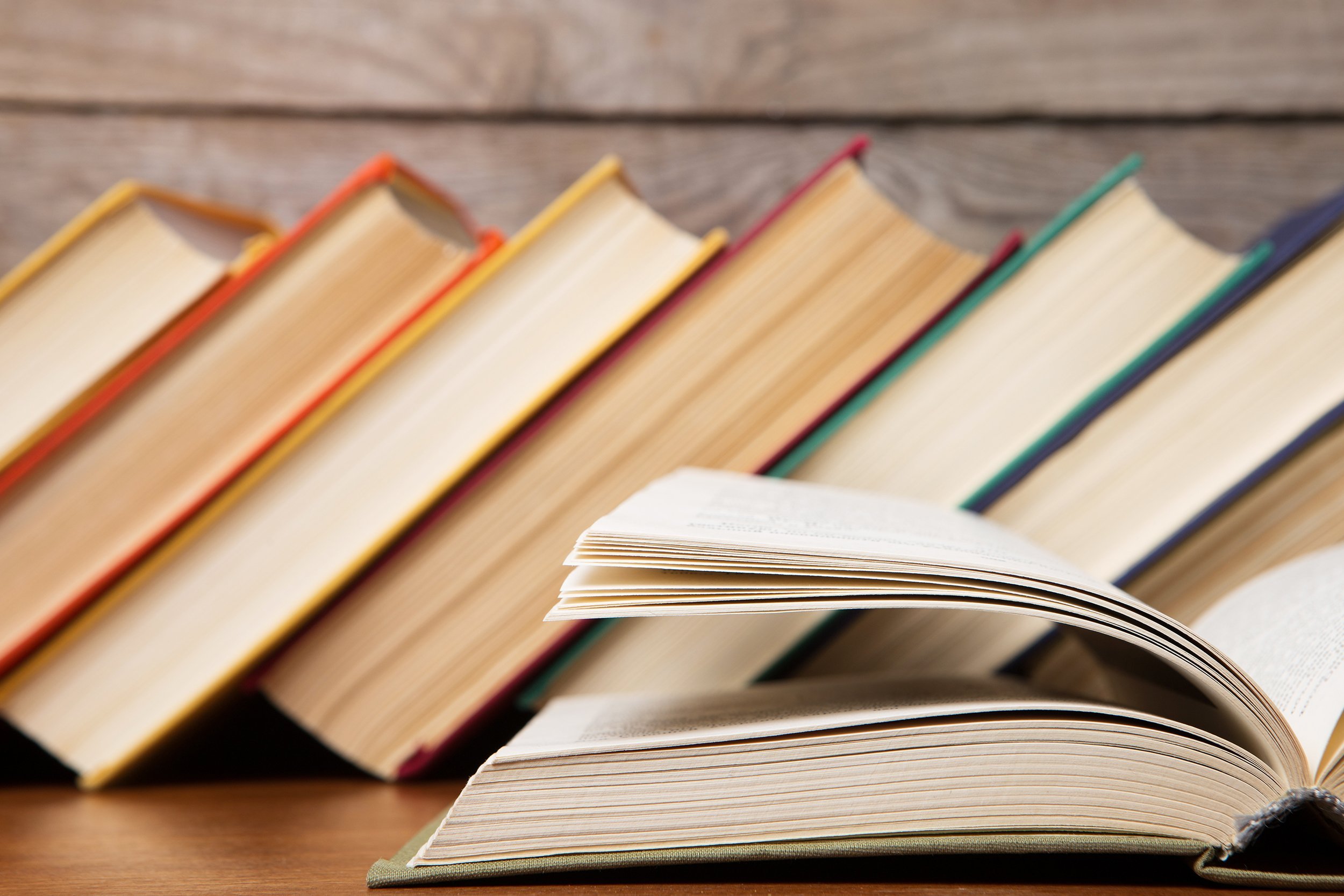 open book with books in background