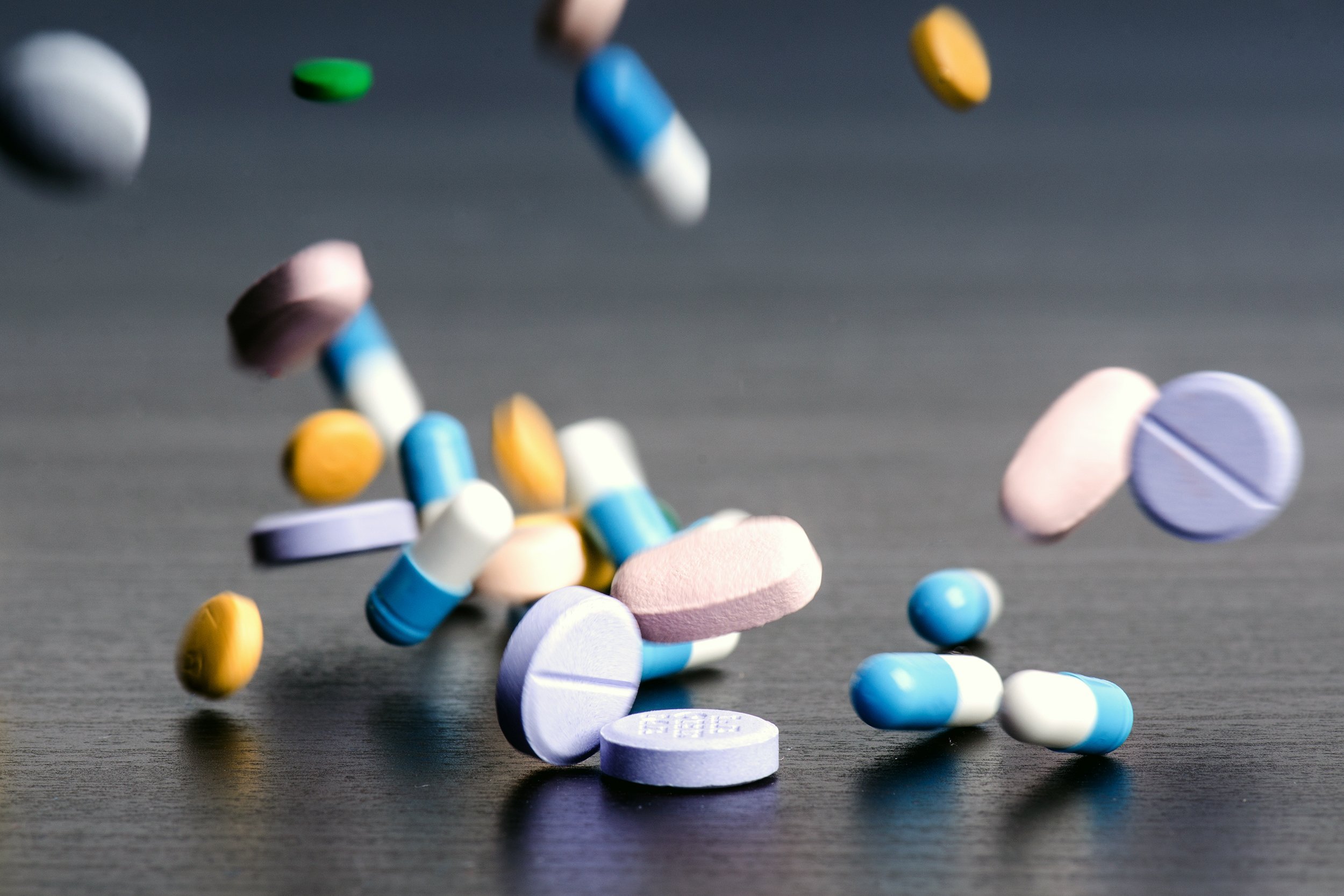 pills falling onto table