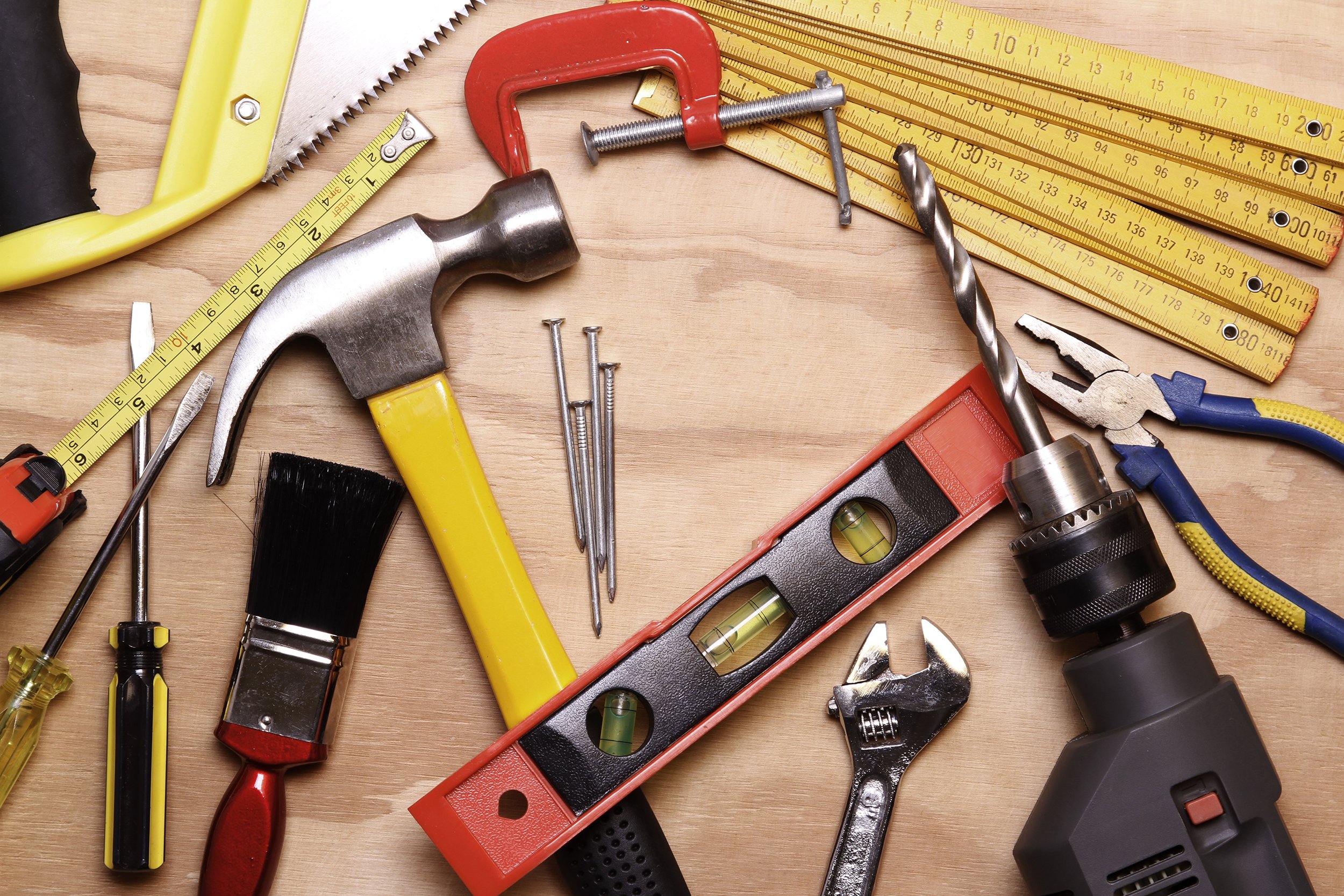 assorted work tools on wood