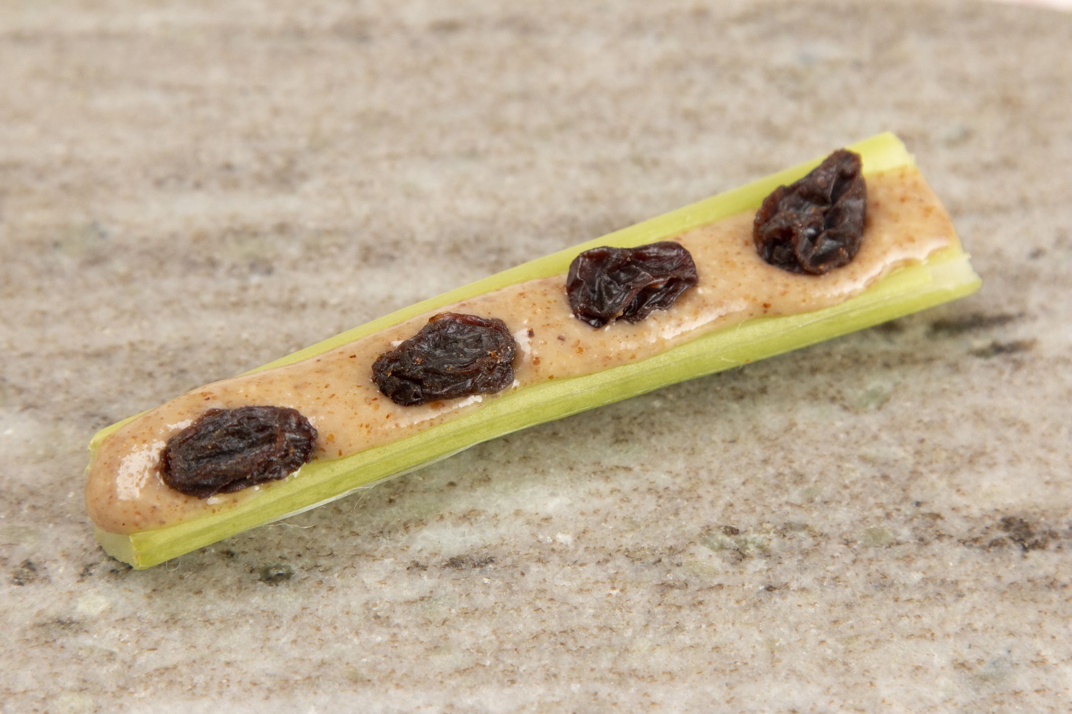 A Healthy Kid Friendly Snack of Celery and Nut Butter