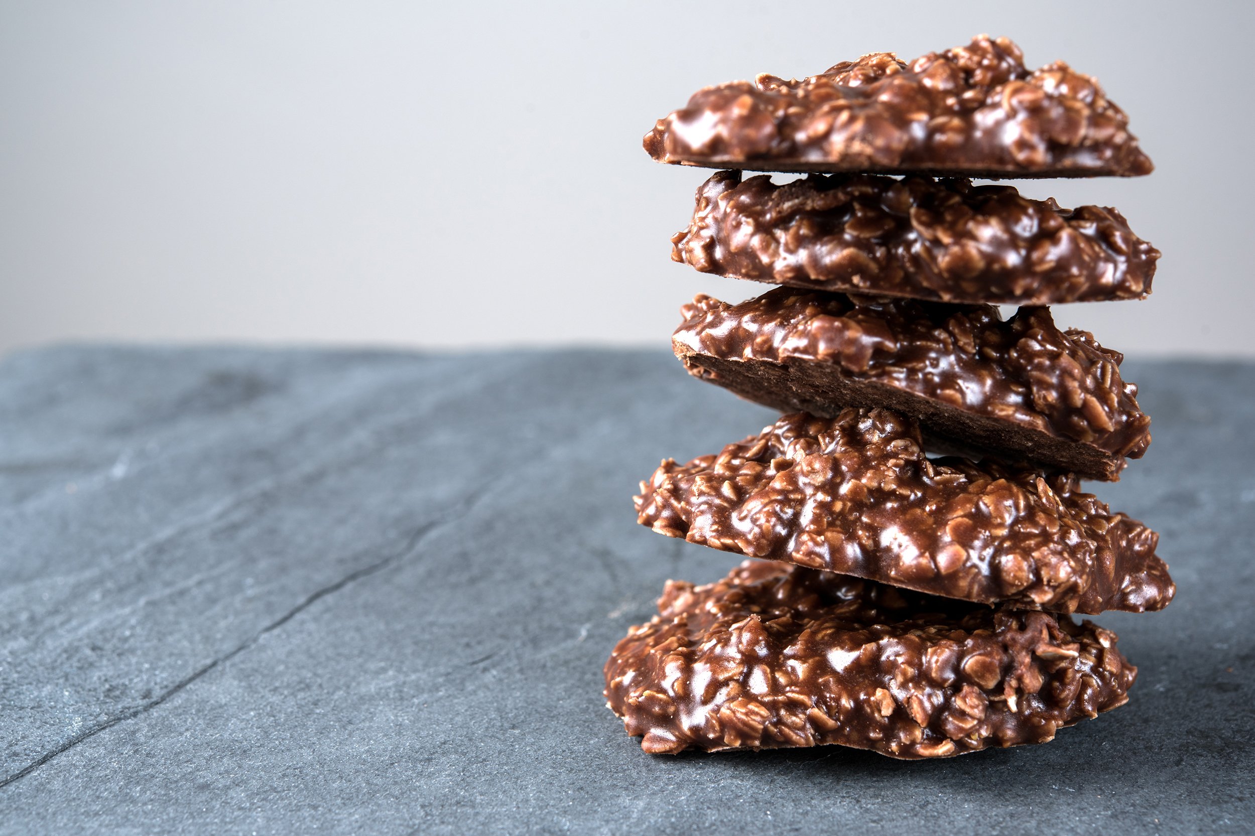 Chocolate and peanut butter no-bake cookies in a stack