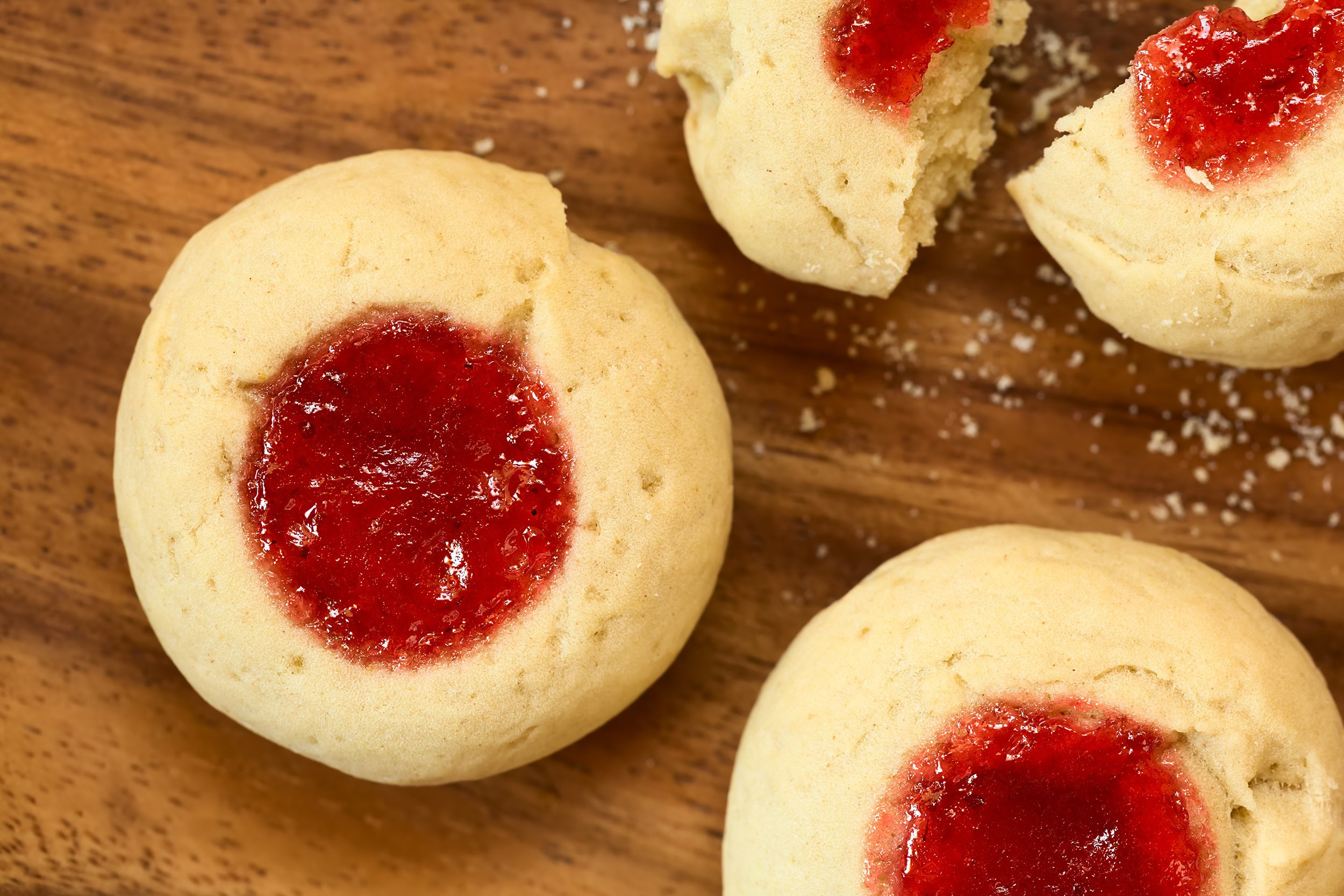 Close-up of thumbprint cookies with raspberry jam in the center