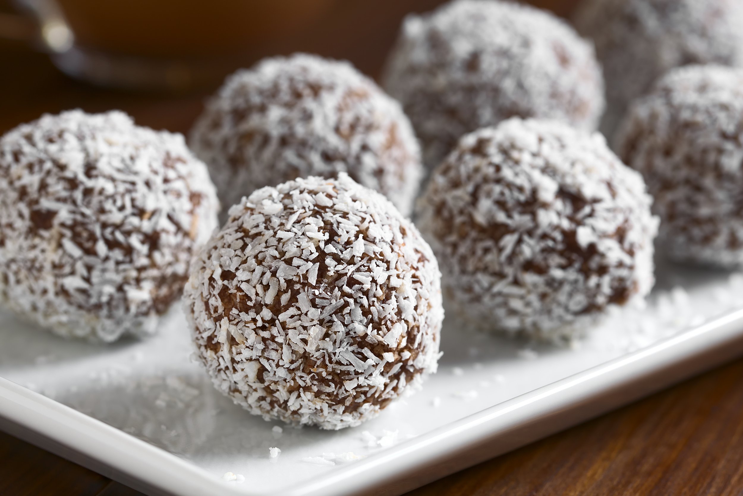 Rum balls covered in shredded coconut