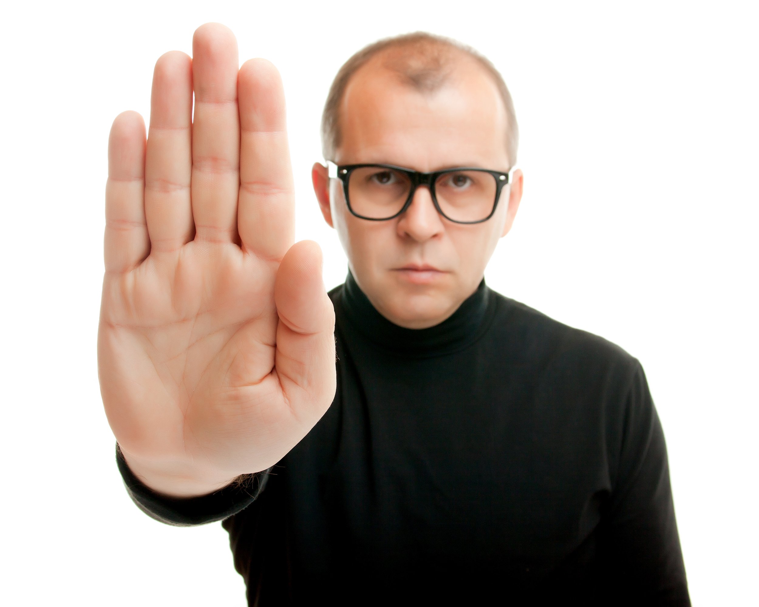 man in black showing rejective hand gesture
