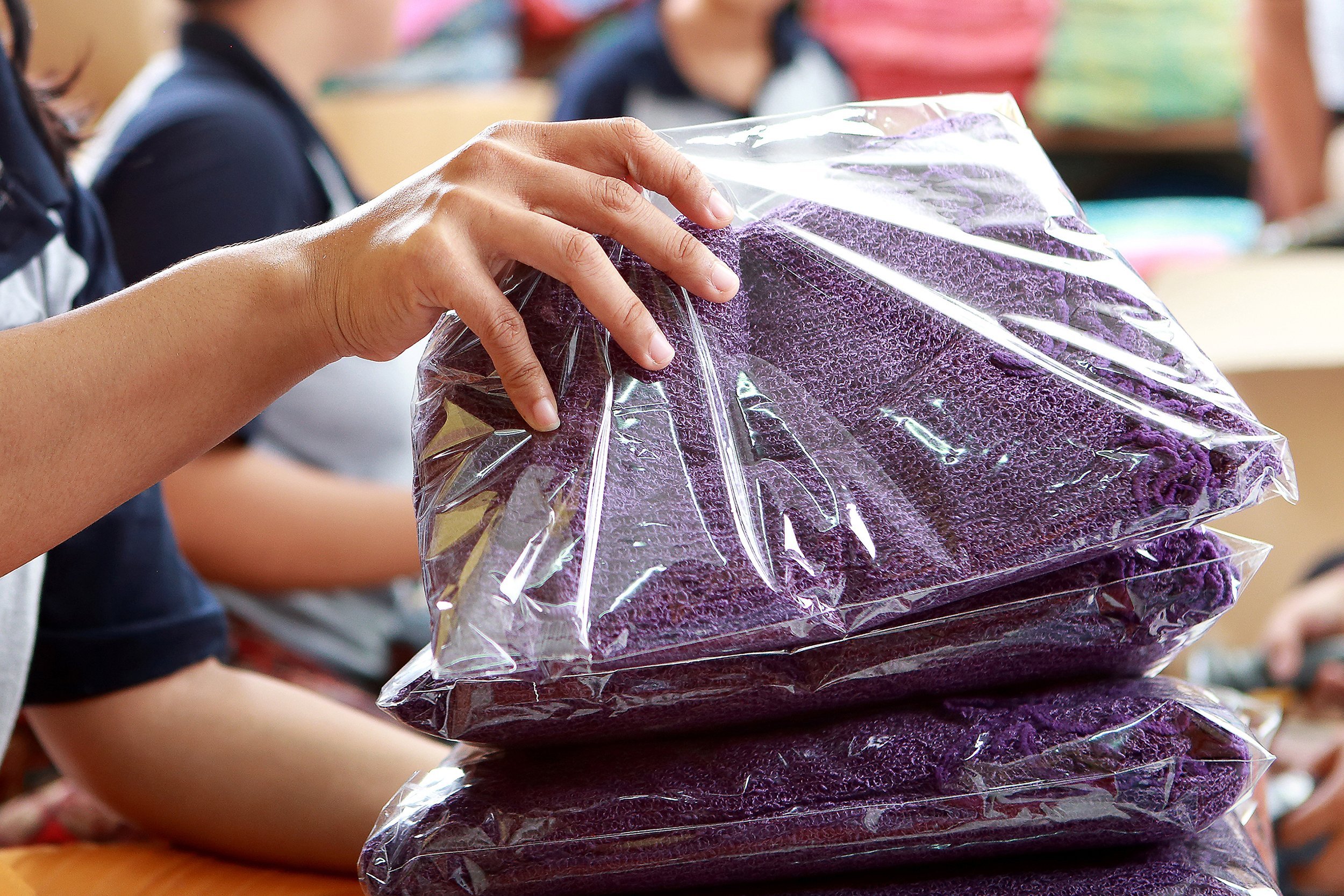 sorting process of clothing products at textile factory