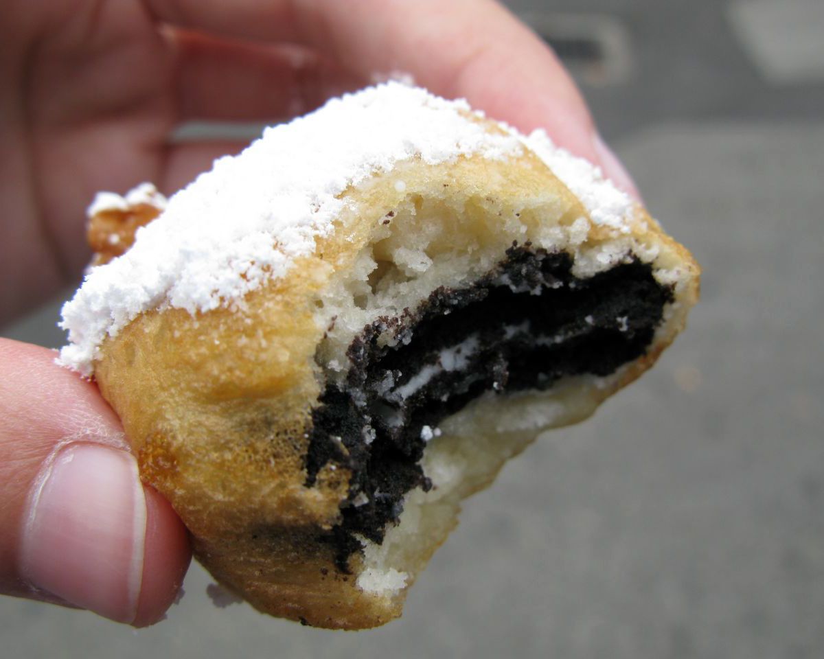 Battered Oreos that are baked with whipped cream ontop