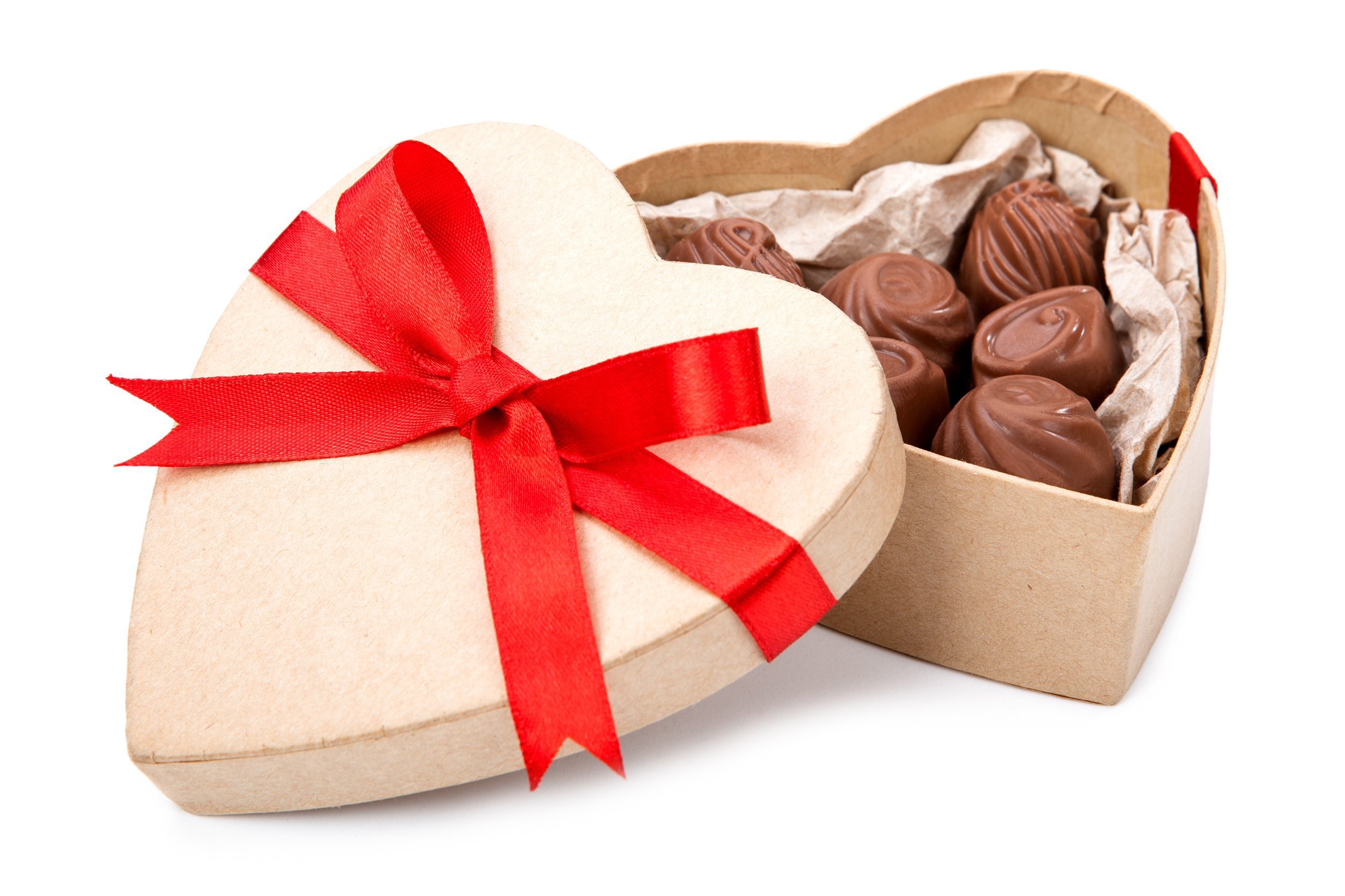 Heart-shaped box of chocolates that is open