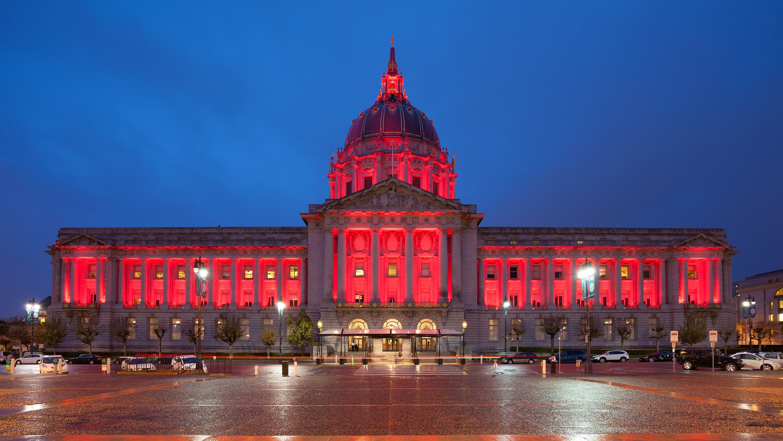 Picture of San Francisco city hall lit in red for World Aids Day