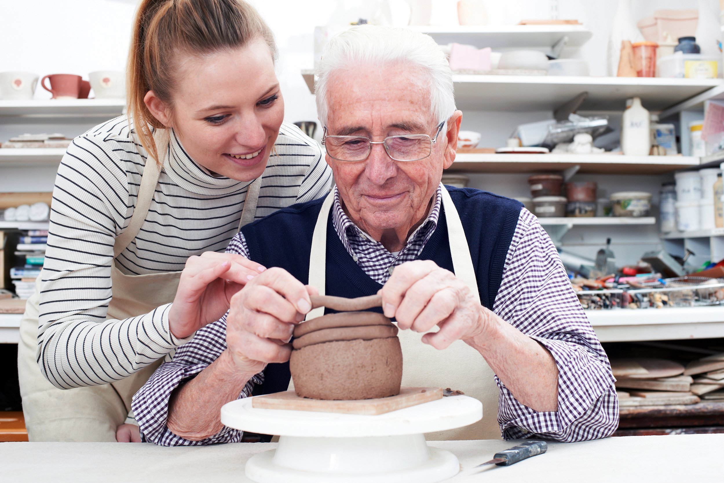 Senior man in a pottery class