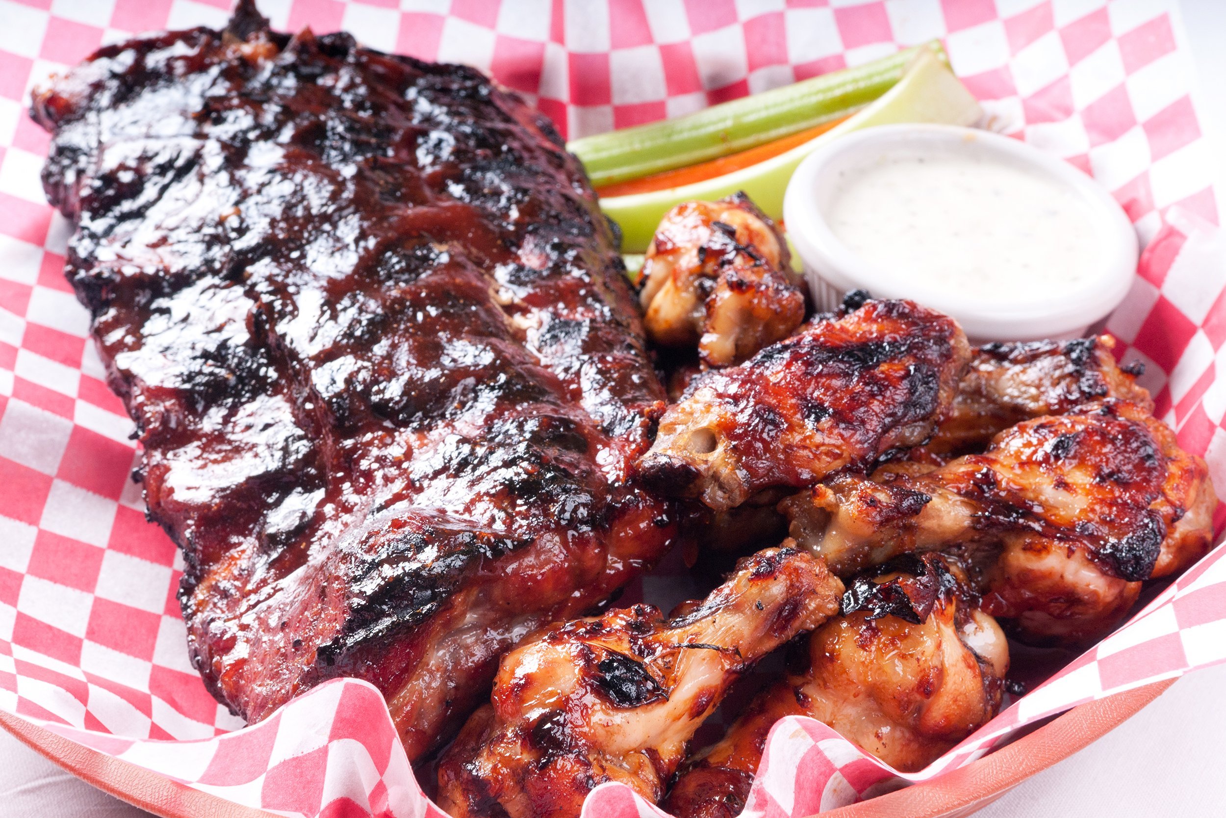 bbq half rack of ribs with a pound of wings