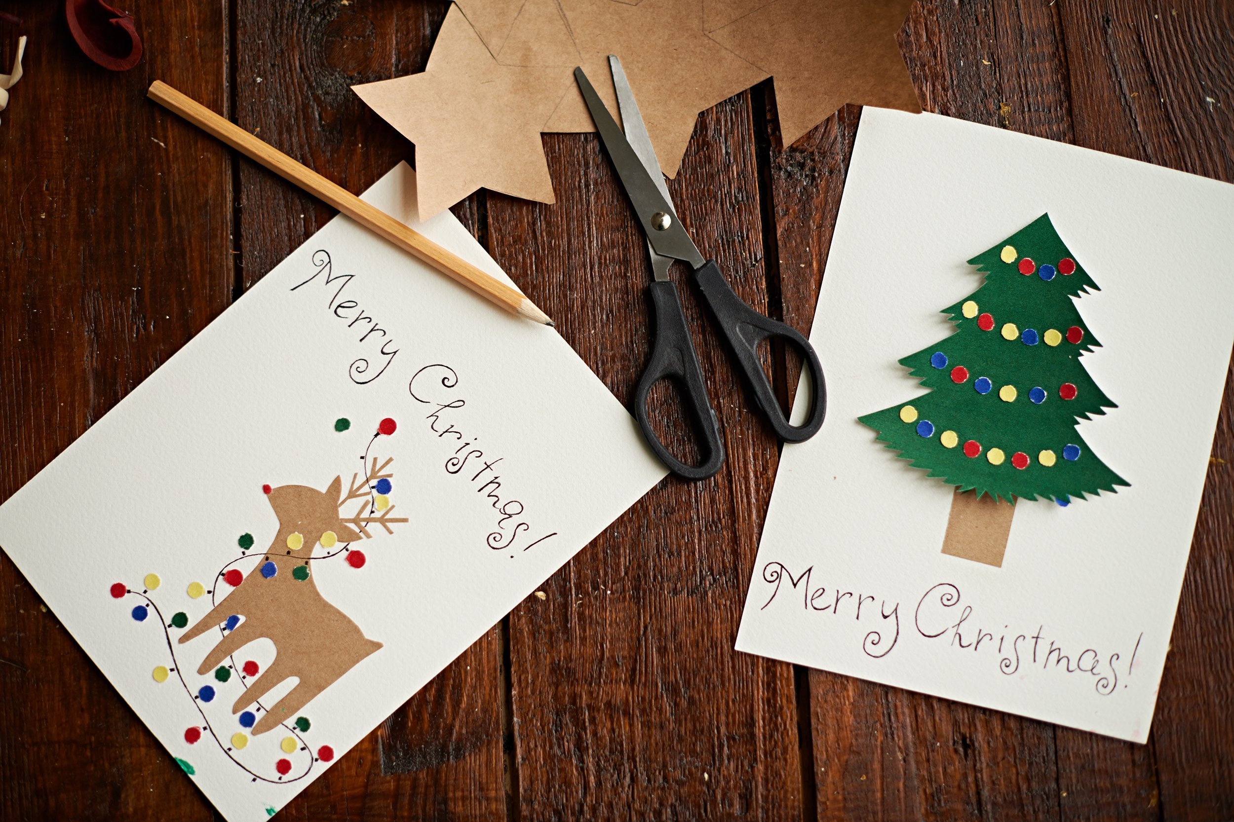 handmade Christmas cards on table