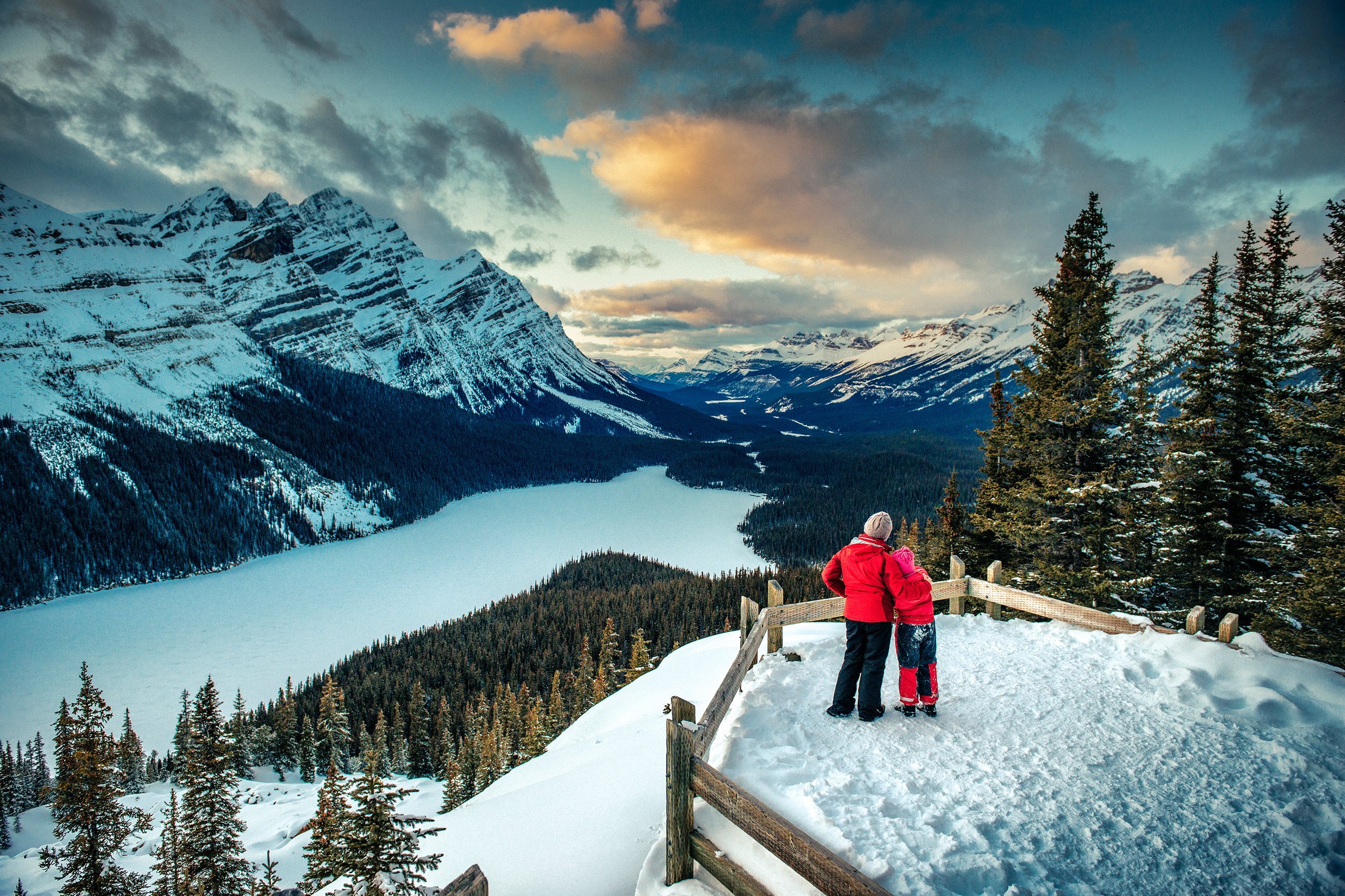 mother and daughter enjoying Banff National Park in winter