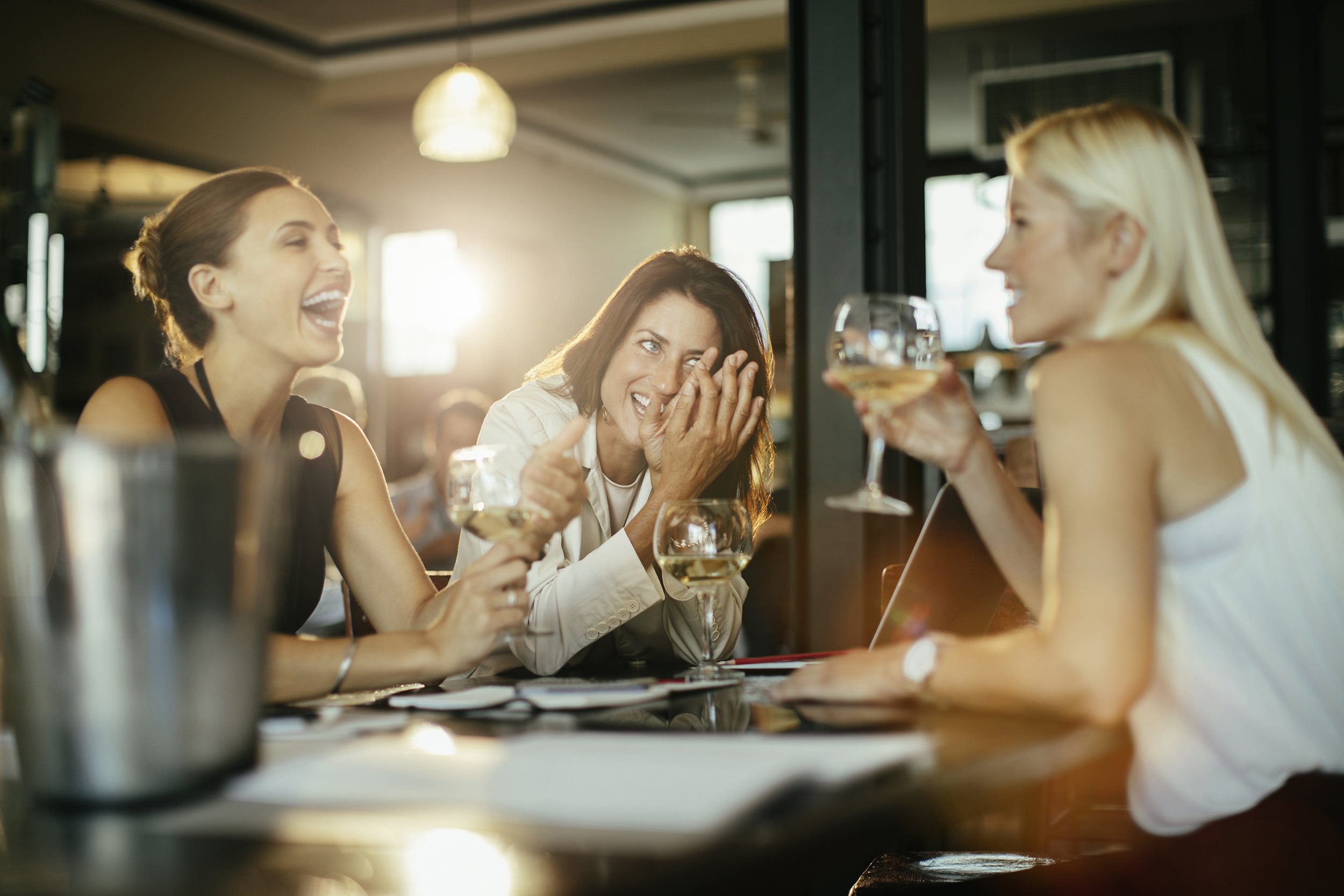 three women having brunch in a restaurant