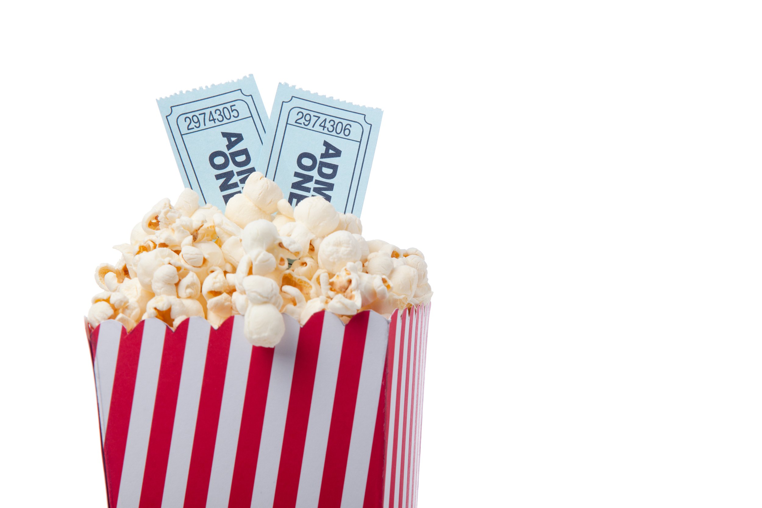 Movie tickets in a bucket of popcorn
