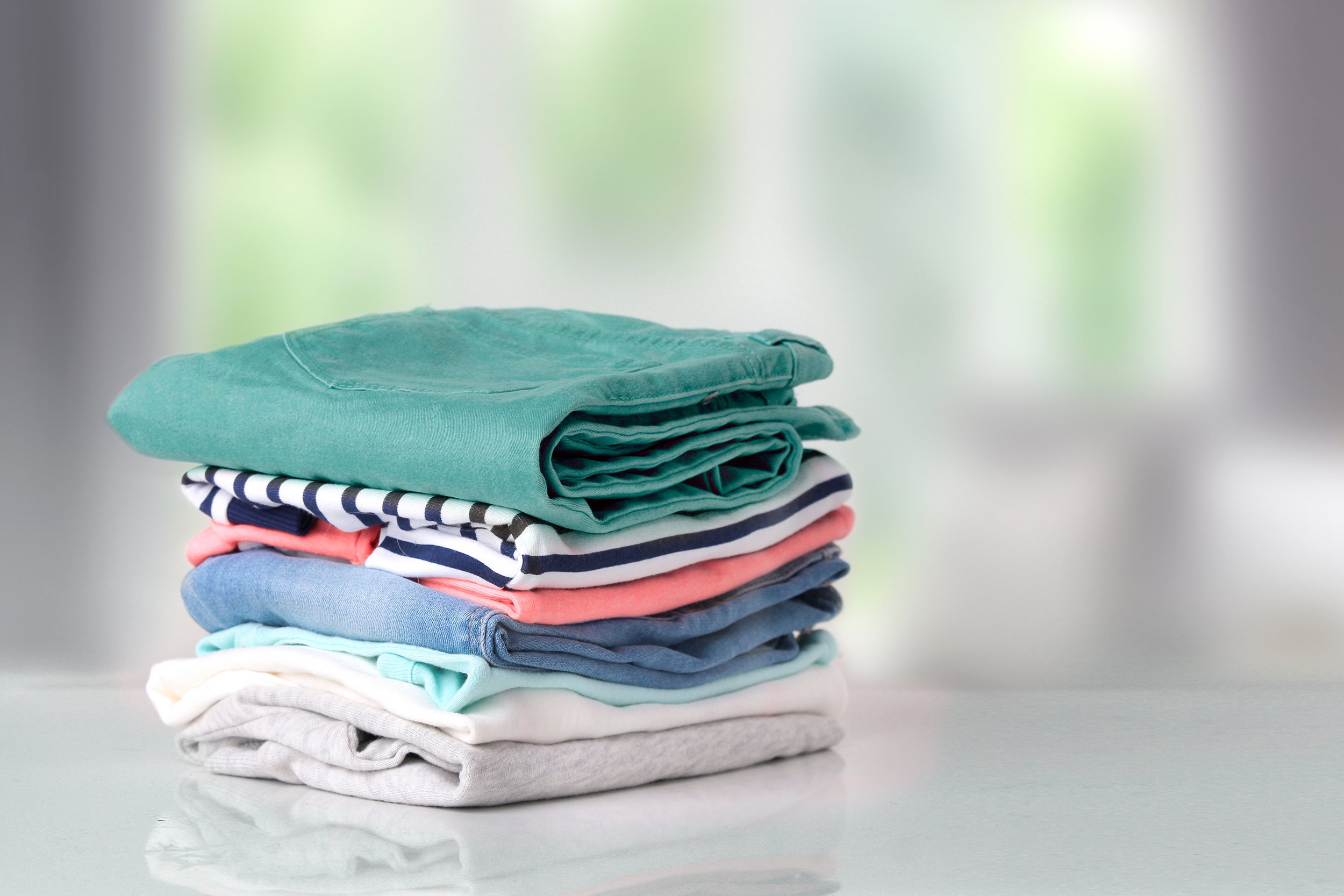 Folded laundry on a table or counter