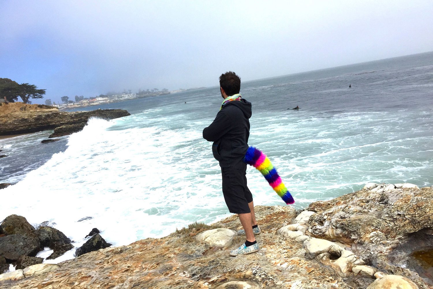 Man wearing a furry tail