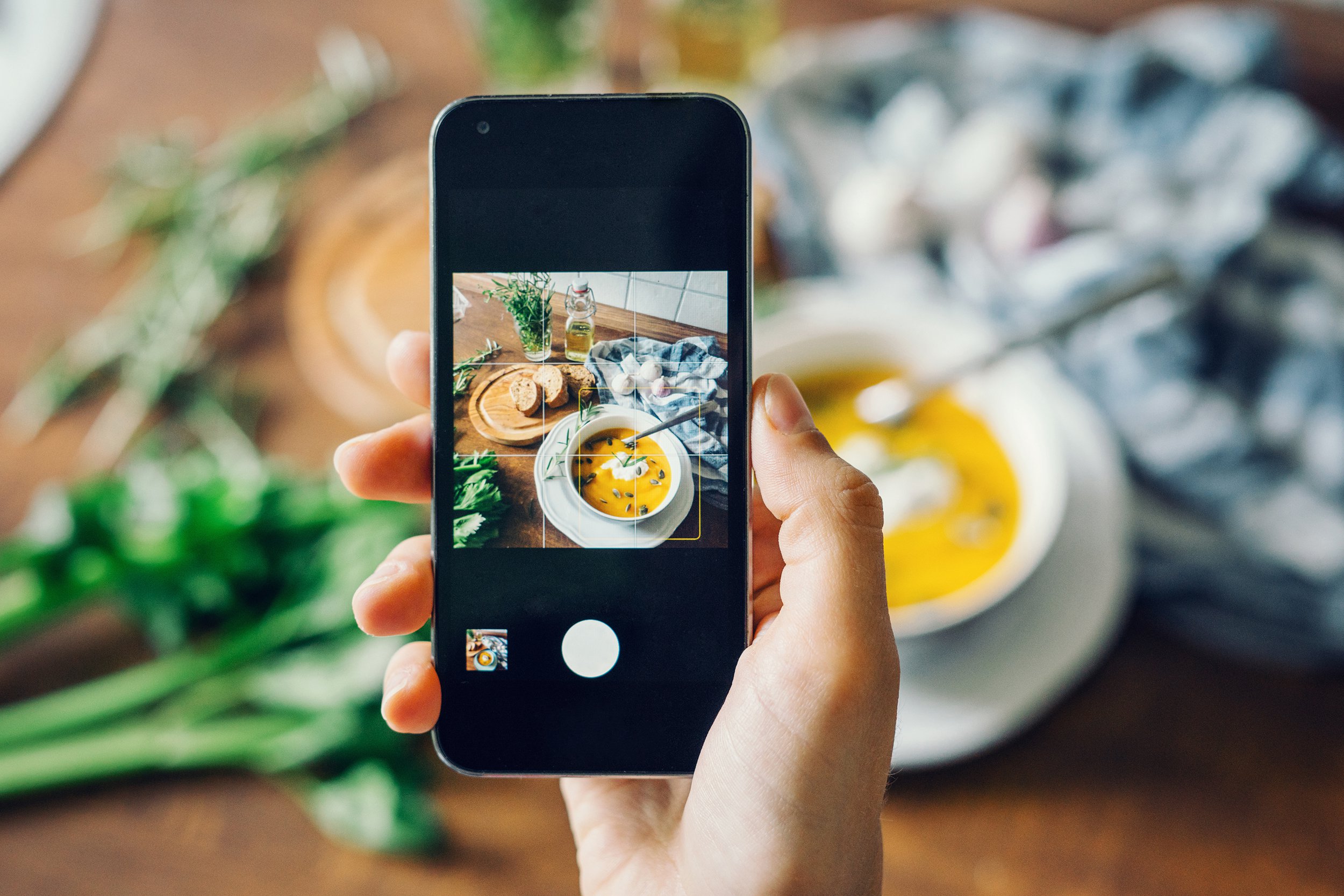 Taking smart phone pictures of food in a restaurant