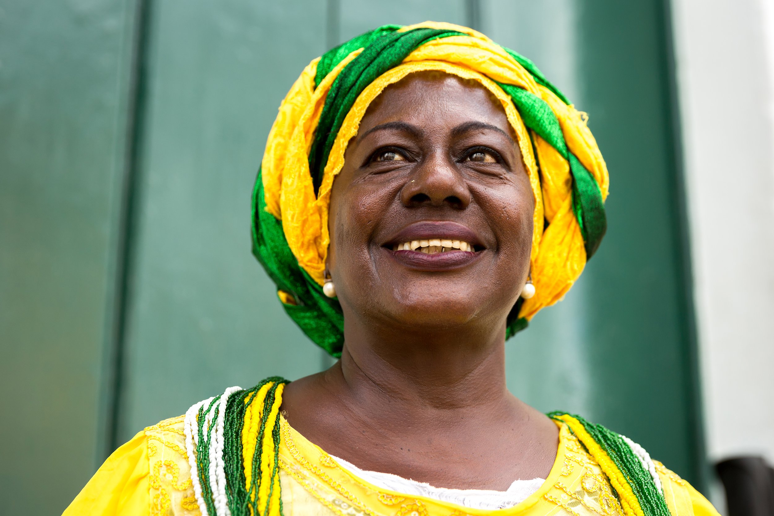 Woman wearing cultural garb in Brazil posing for photo