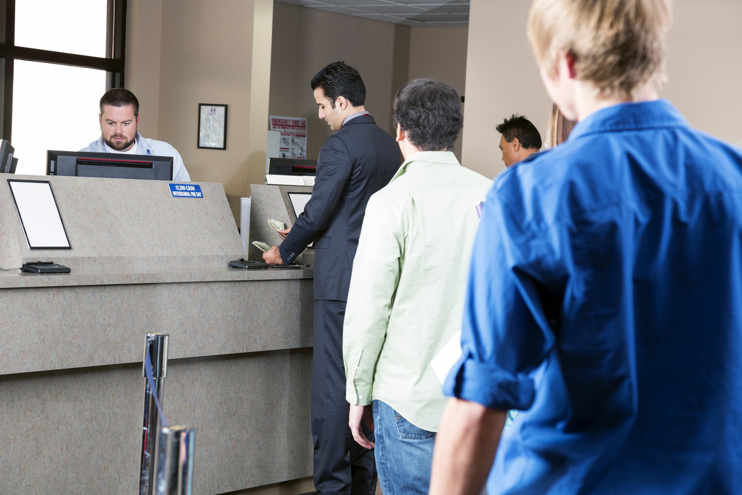 Waiting in line at the bank