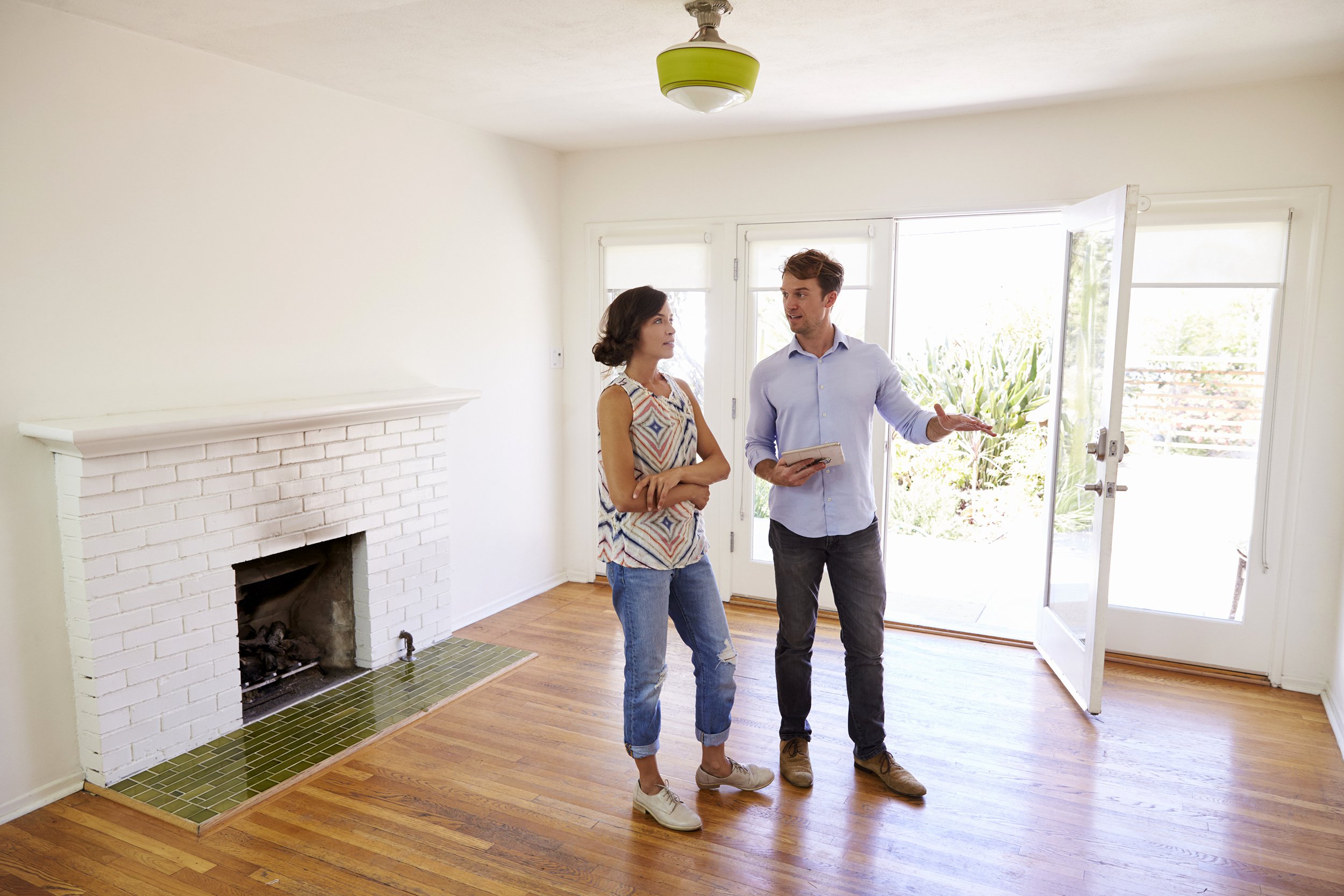 Couple inspecting new house