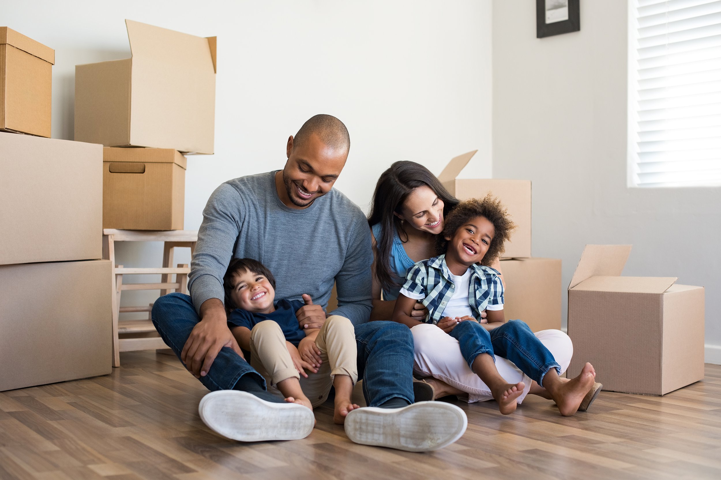 Family with young kids in new house