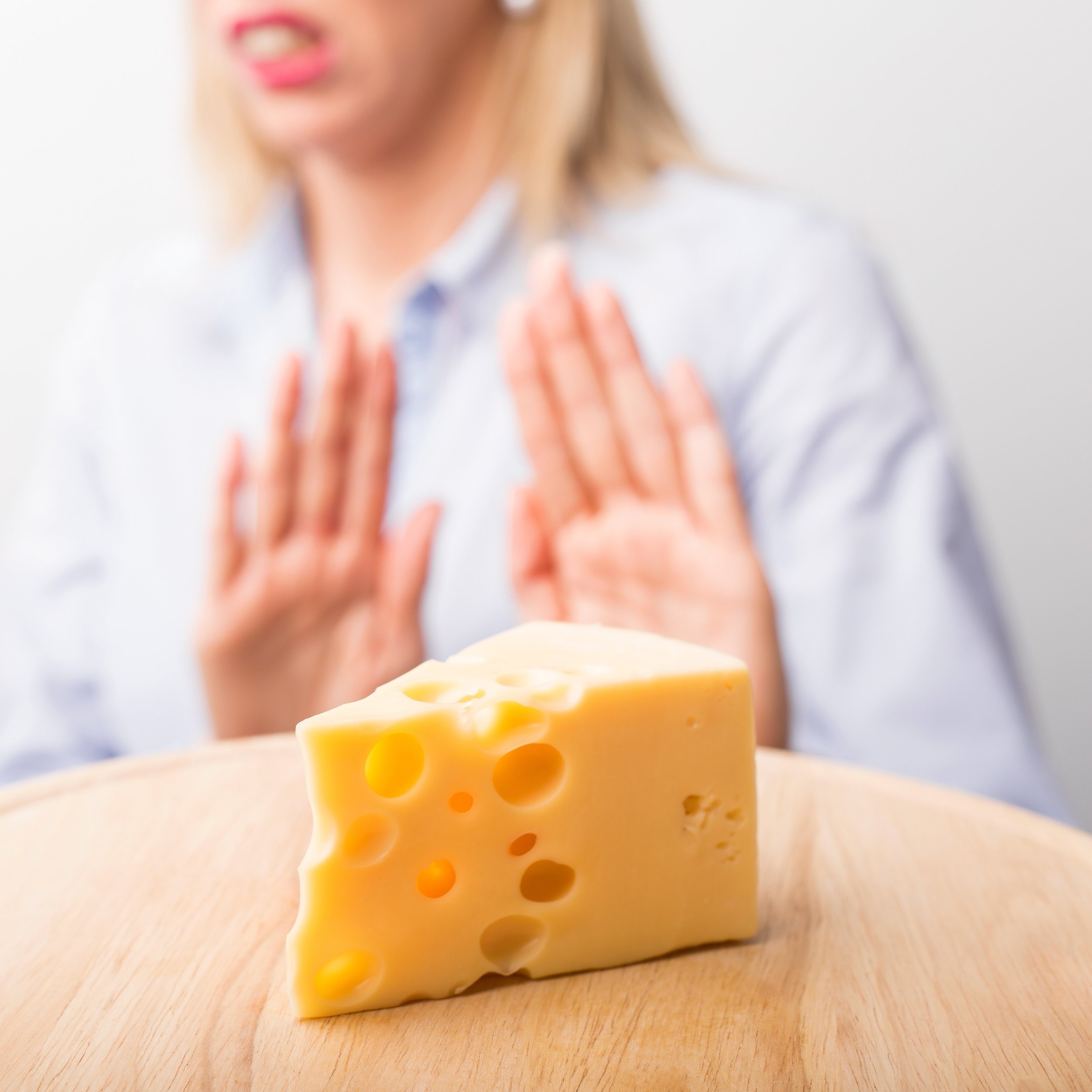 woman saying no to cheese
