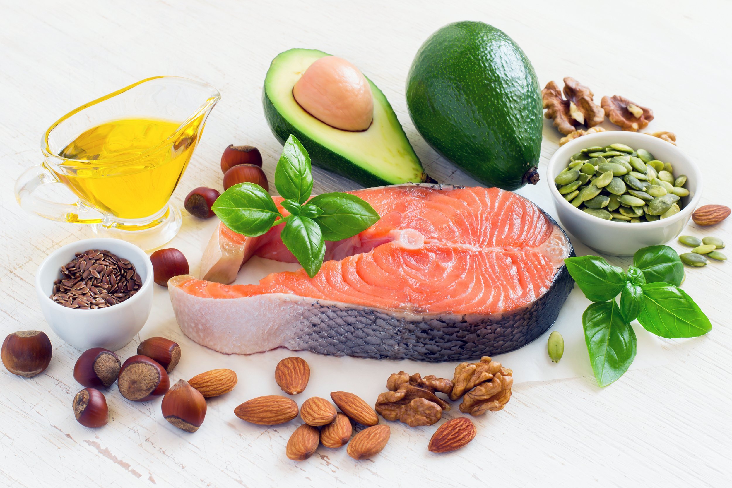 Selection of foods high in omega 3 fatty acids like salmon and nuts