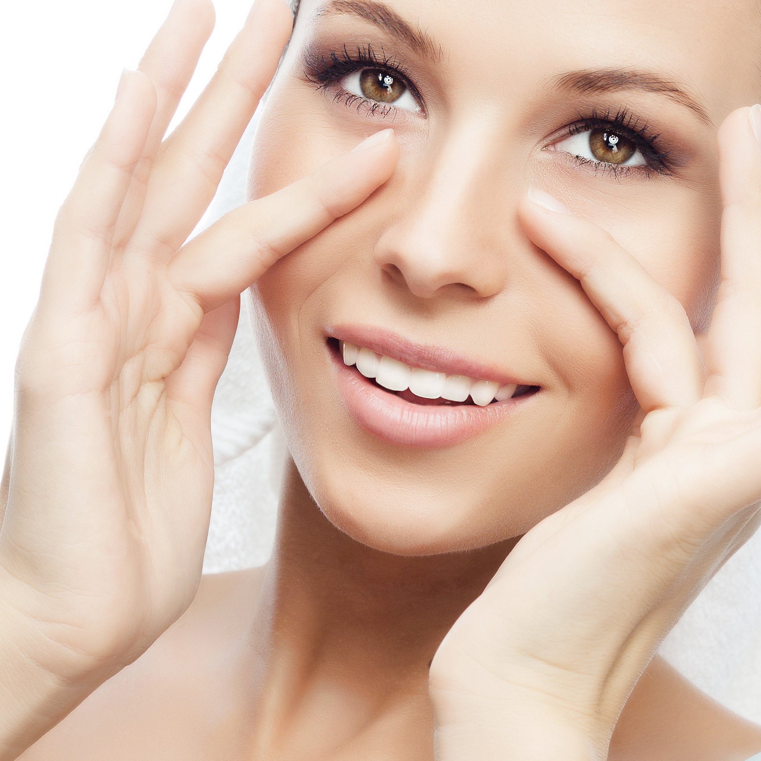 woman massaging face