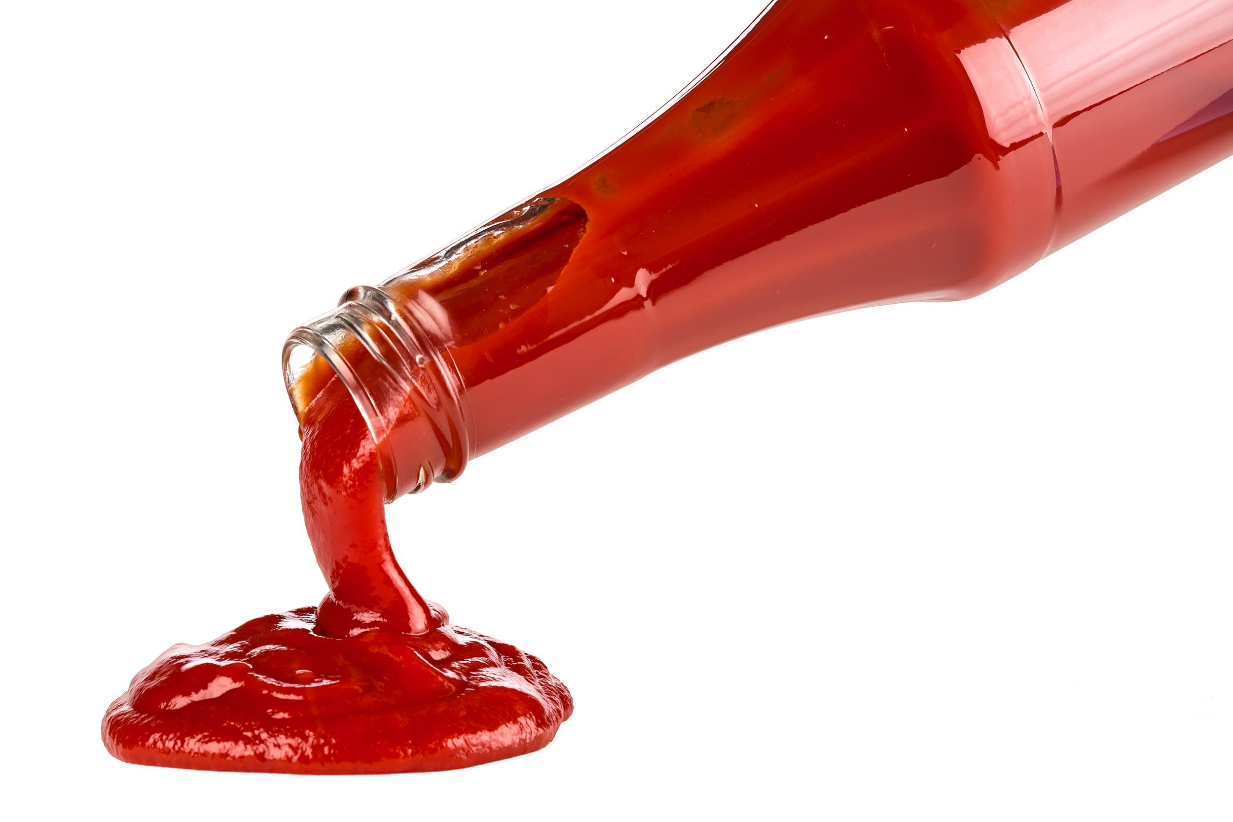 ketchup pouring out of bottle