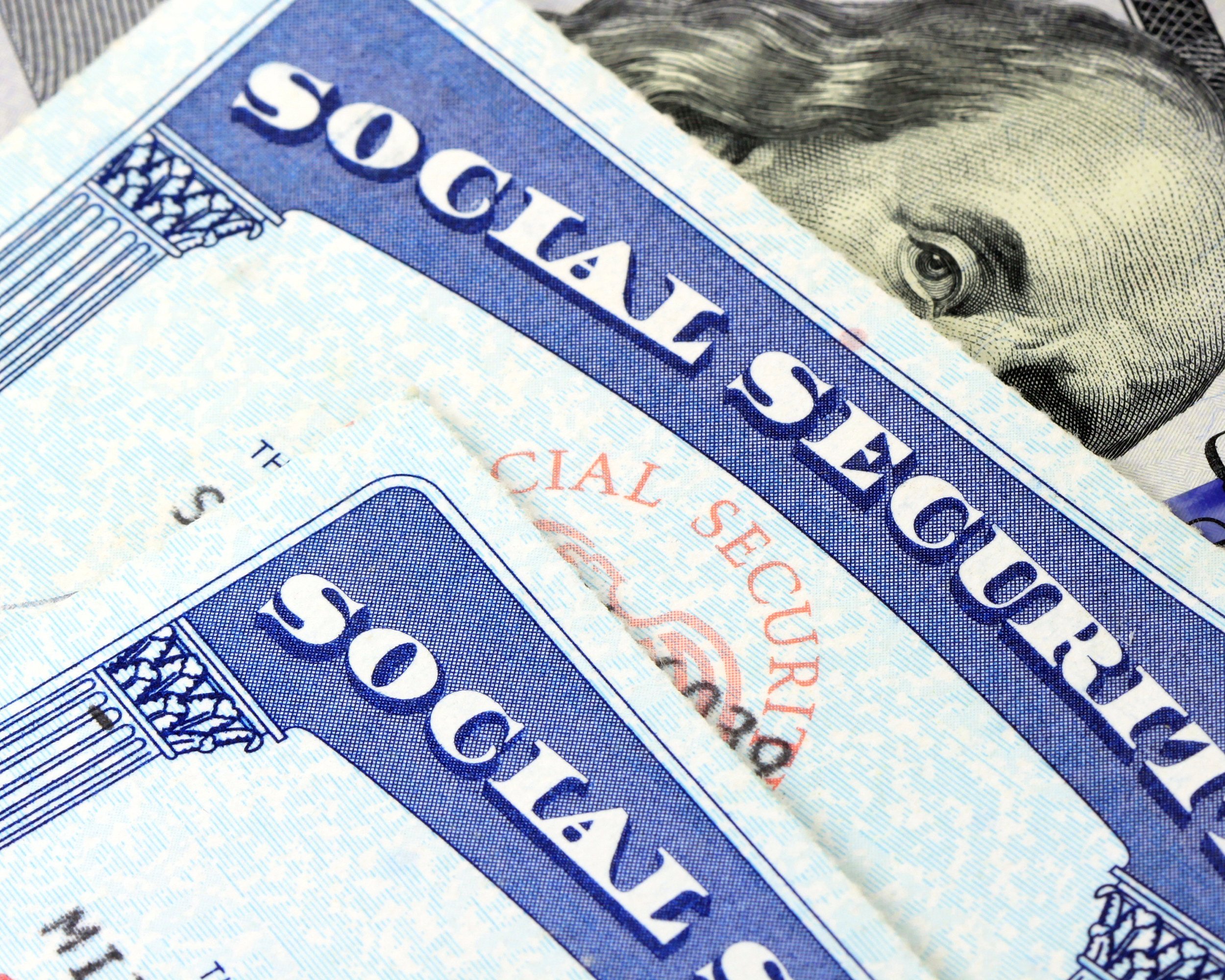 social security card and US currency