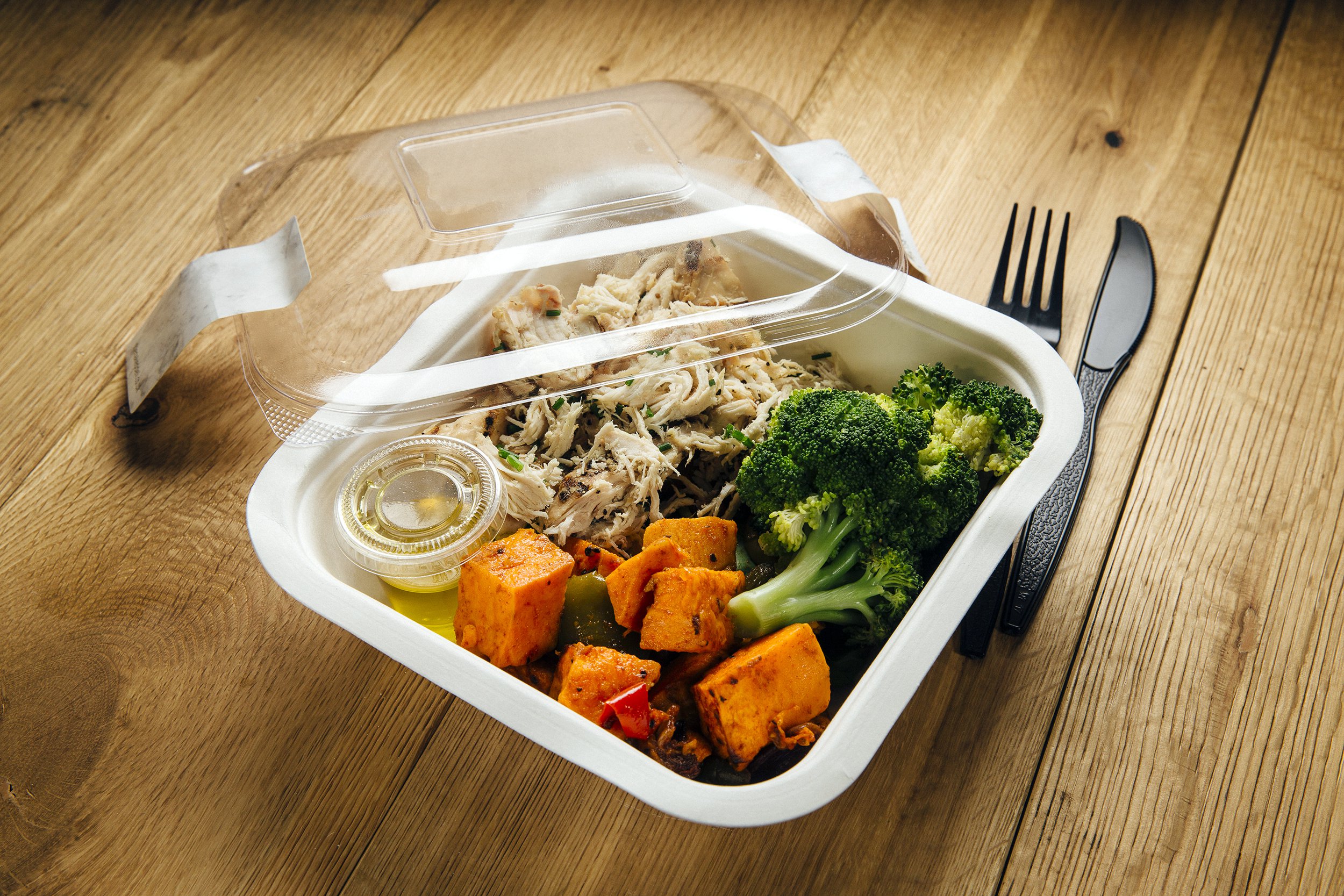 Healthy prepared meal in a plastic container