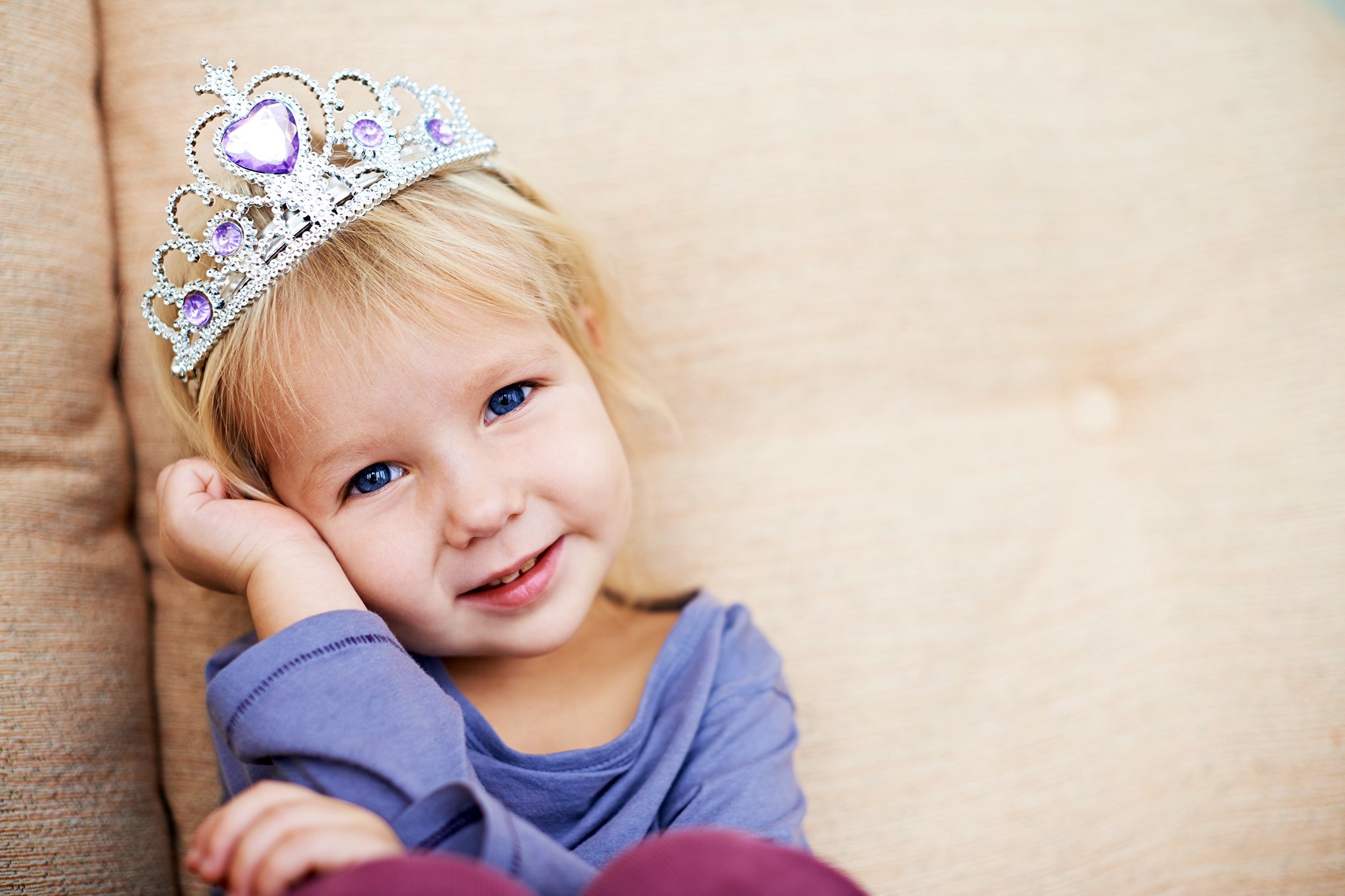 Little girl wearing a princess crown