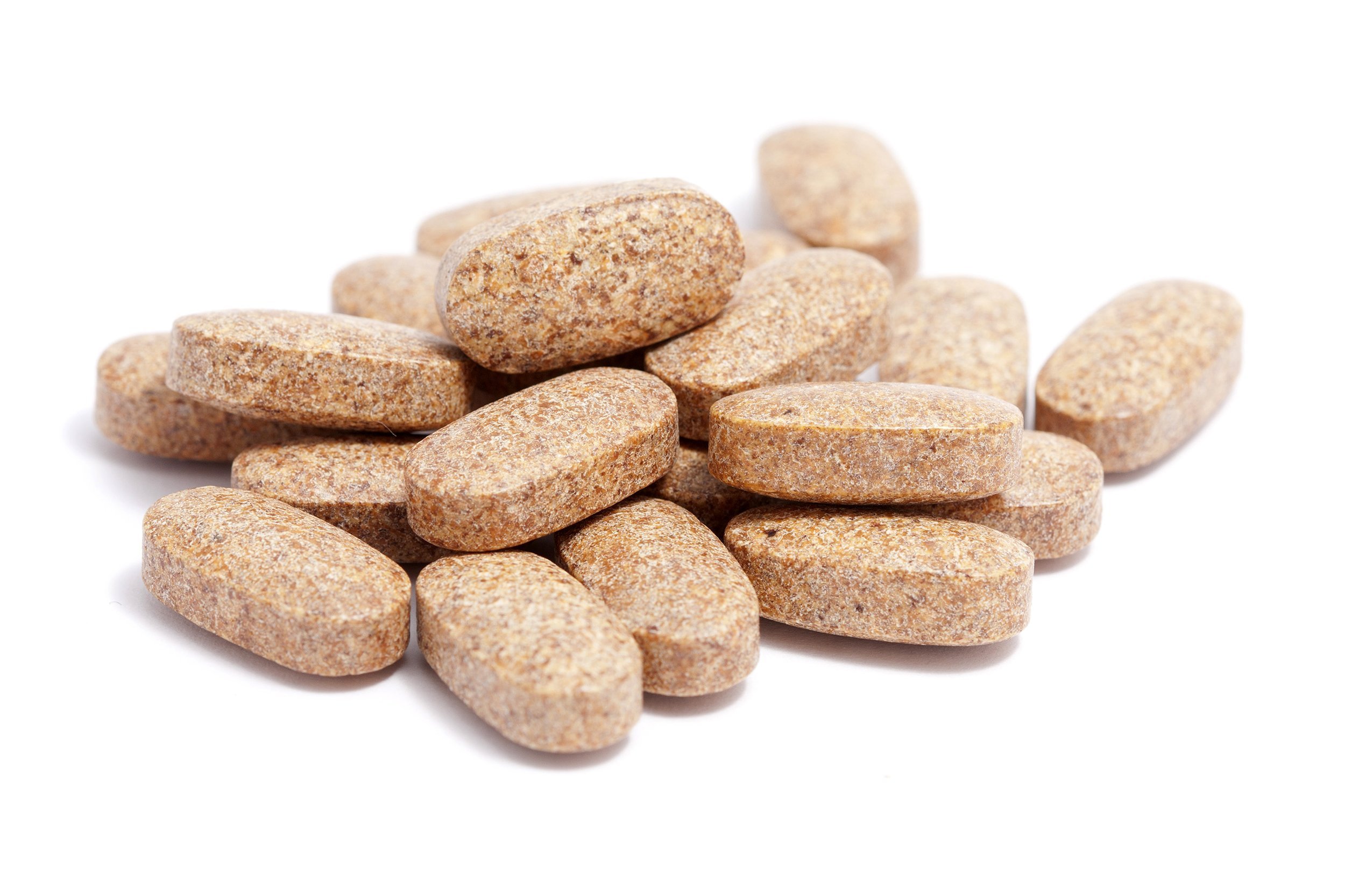 pile of multivitamin tablets