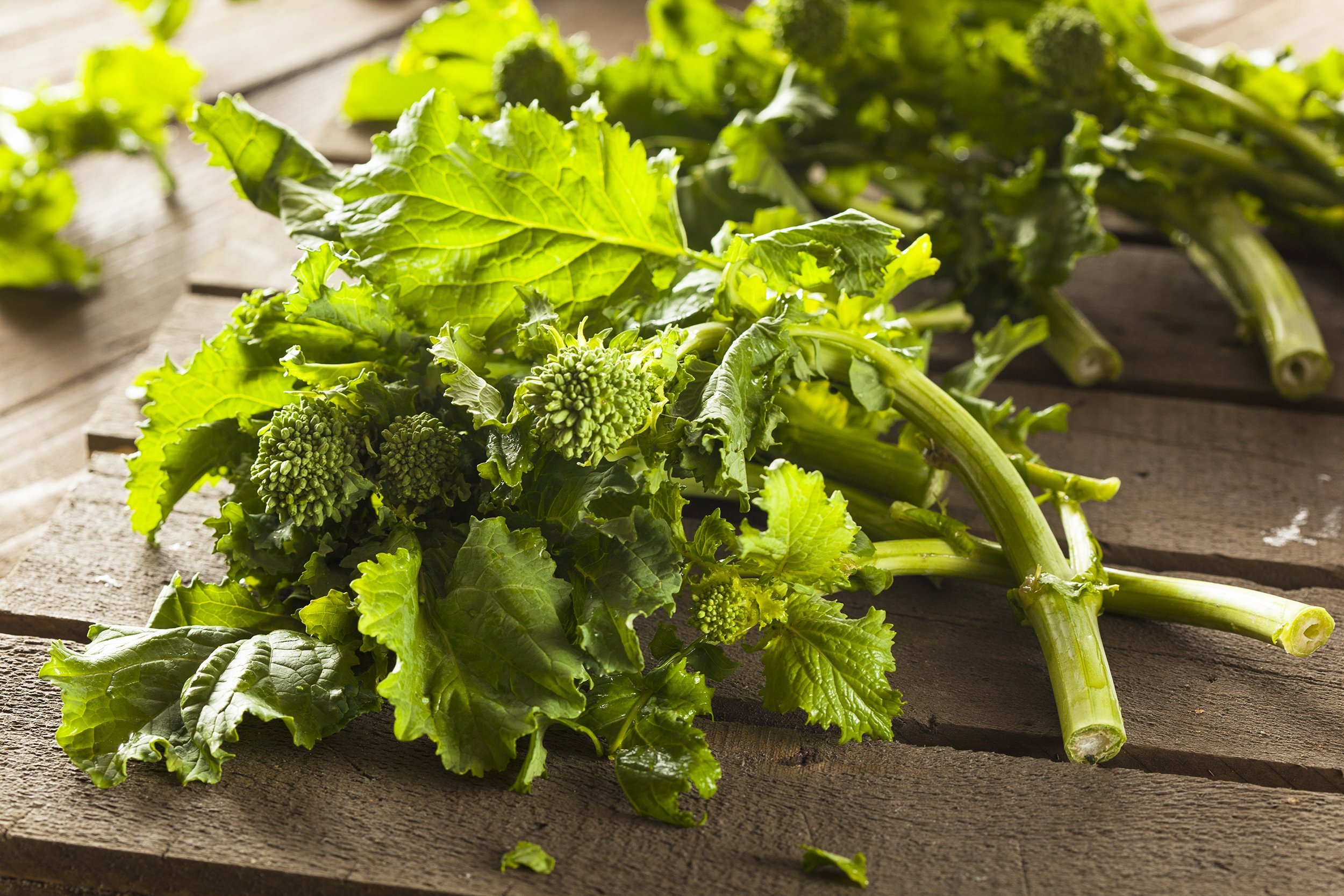 broccoli rabe rapini on a wooden table