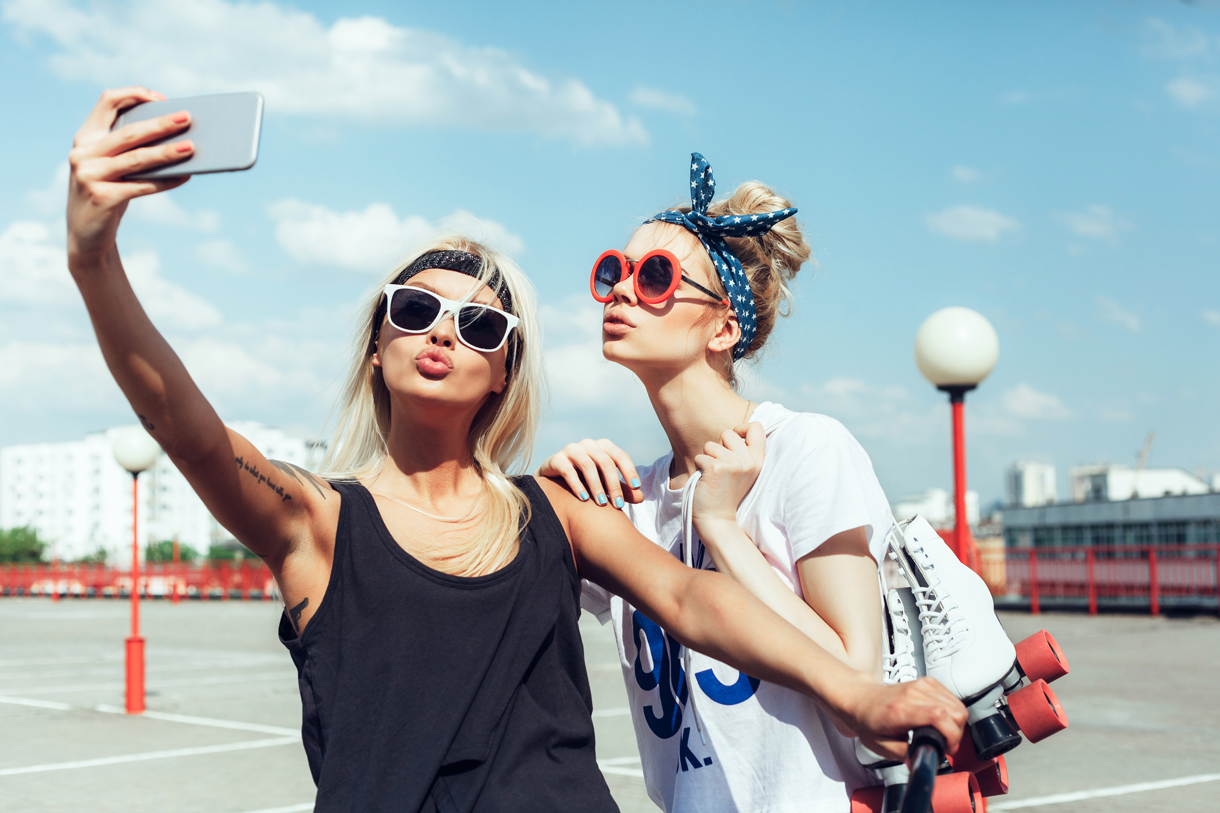 Women posing and pouting lips to take a selfie