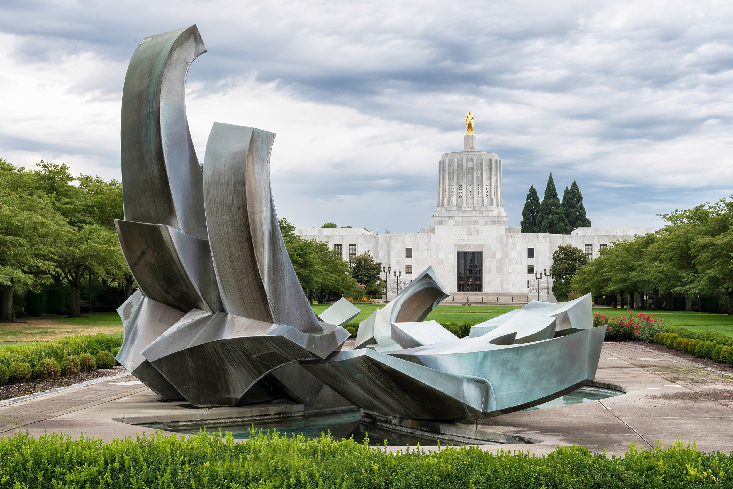 modern sculpture in front of the Oregon State Capitol building in Salem, Oregon