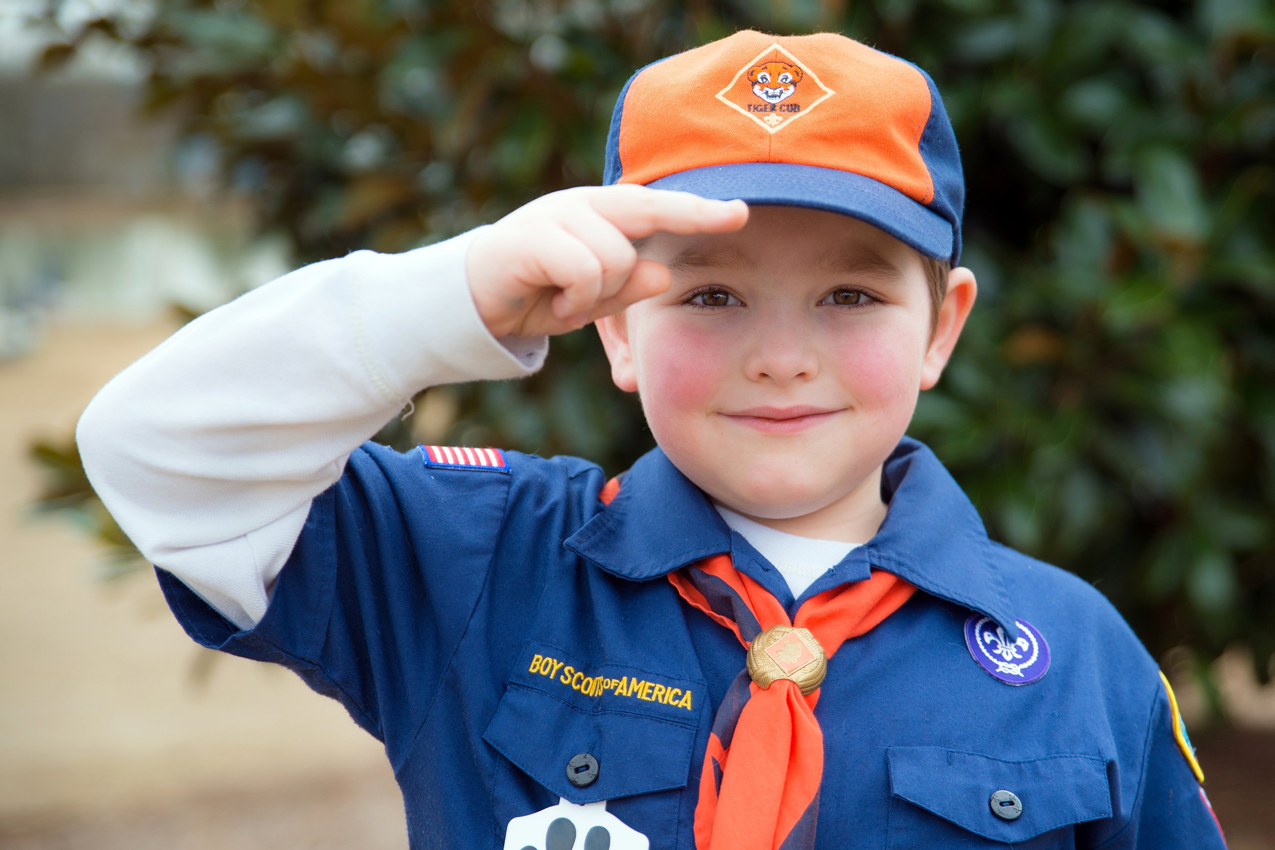 Cub Scout gives the Boy Scout salute