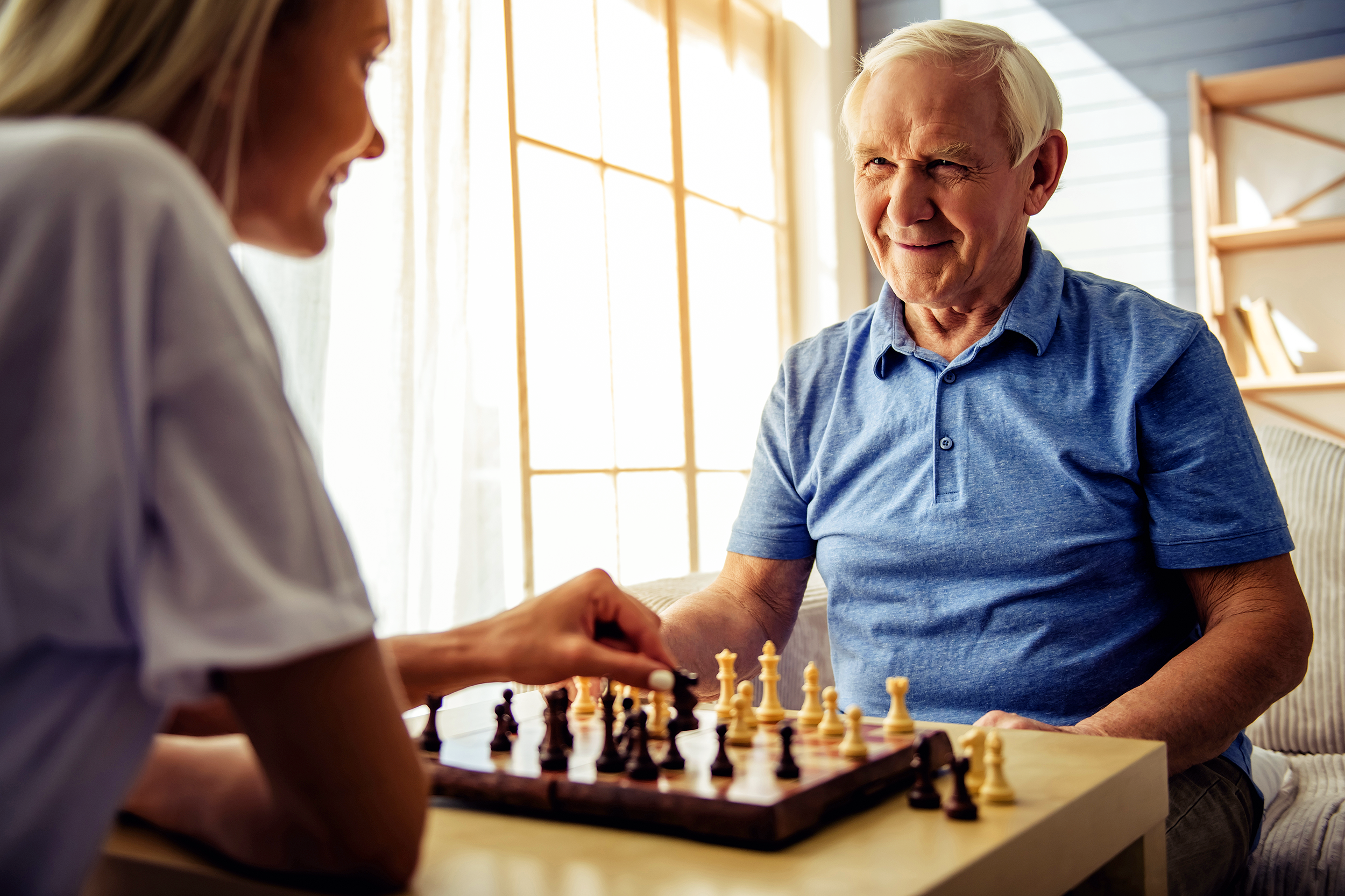 Senior man playing chess