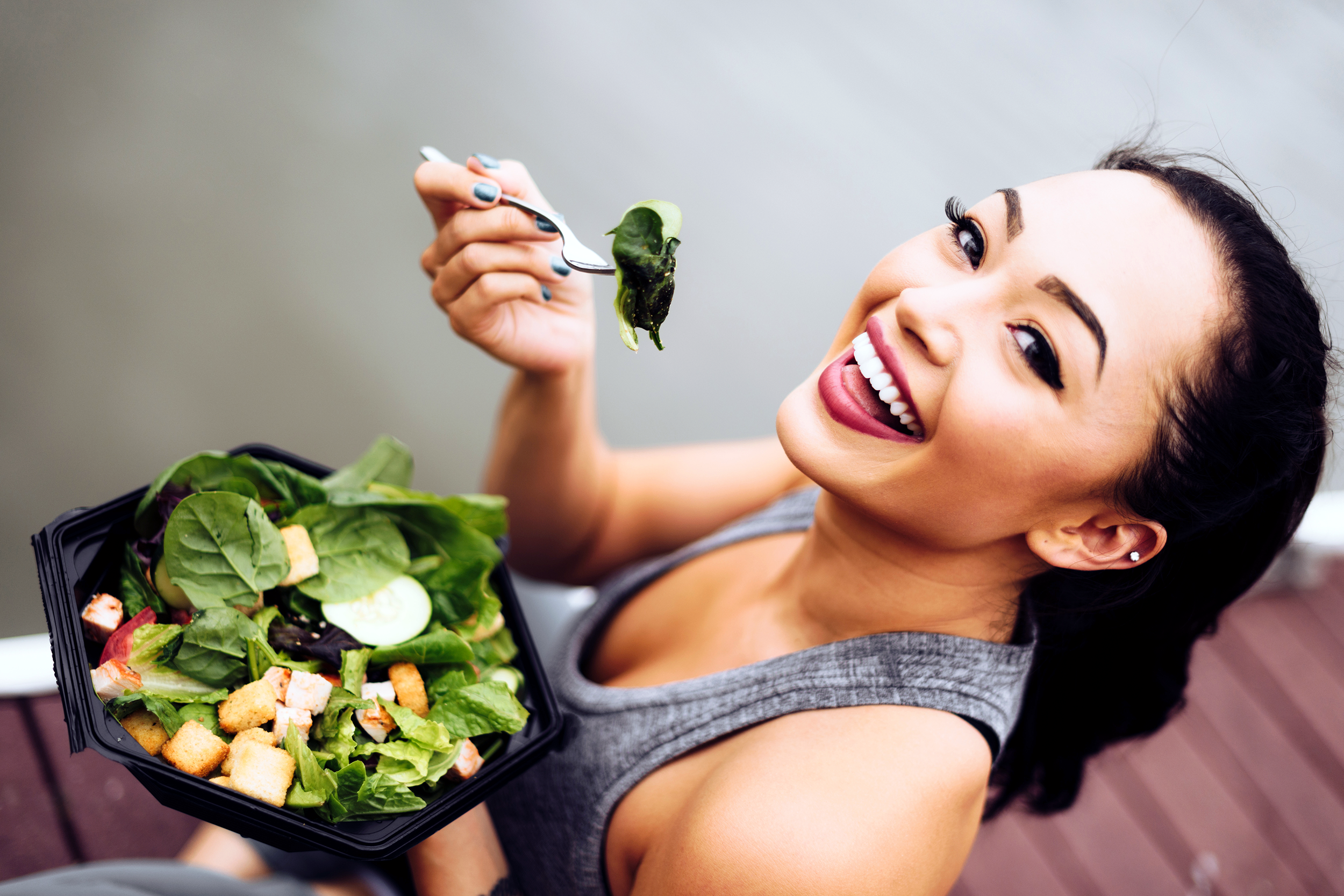 Woman eating a salad