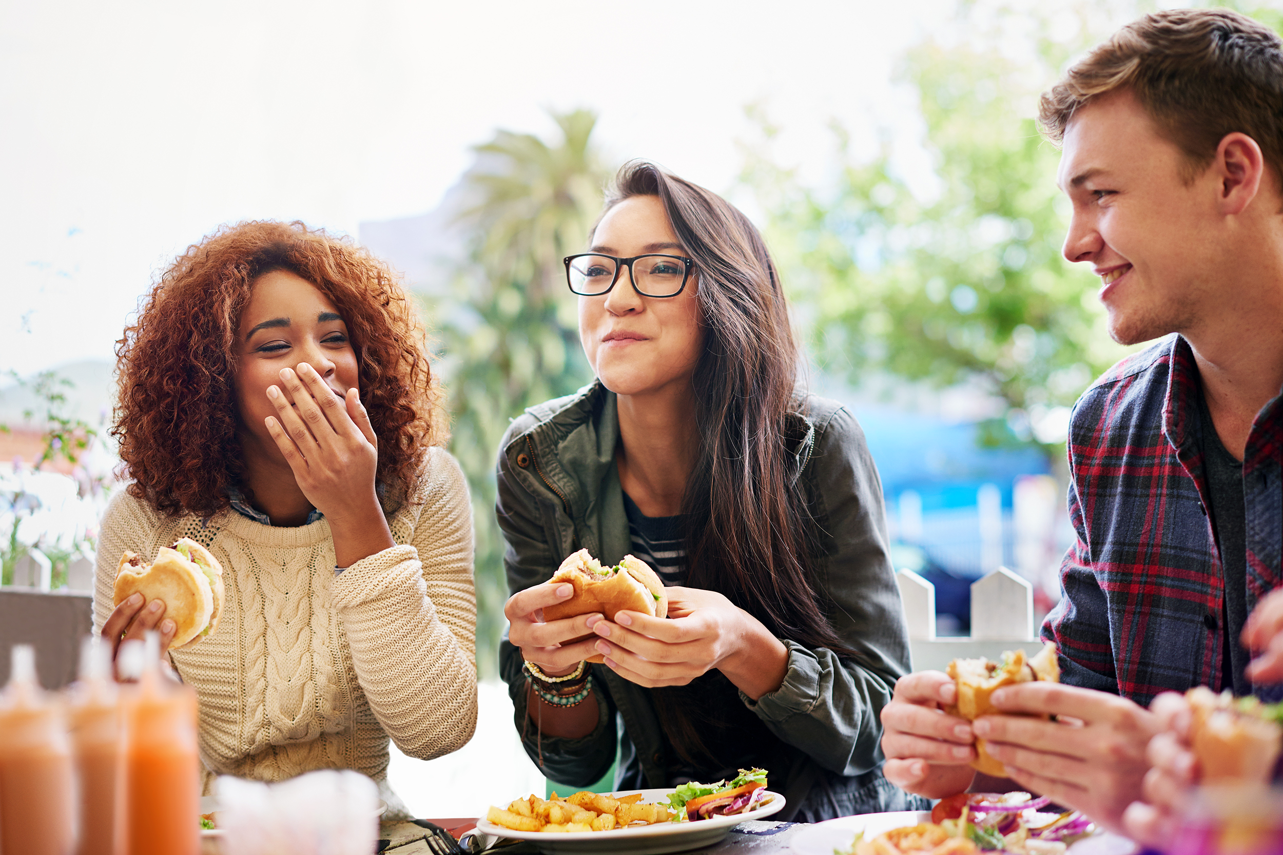Group of friends enjoying burgers