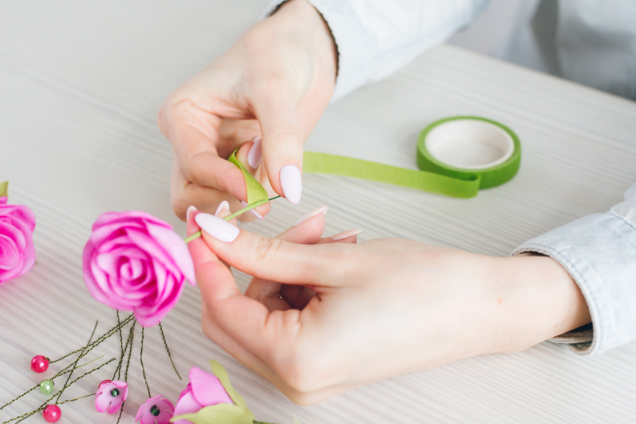 Woman making a floral craft