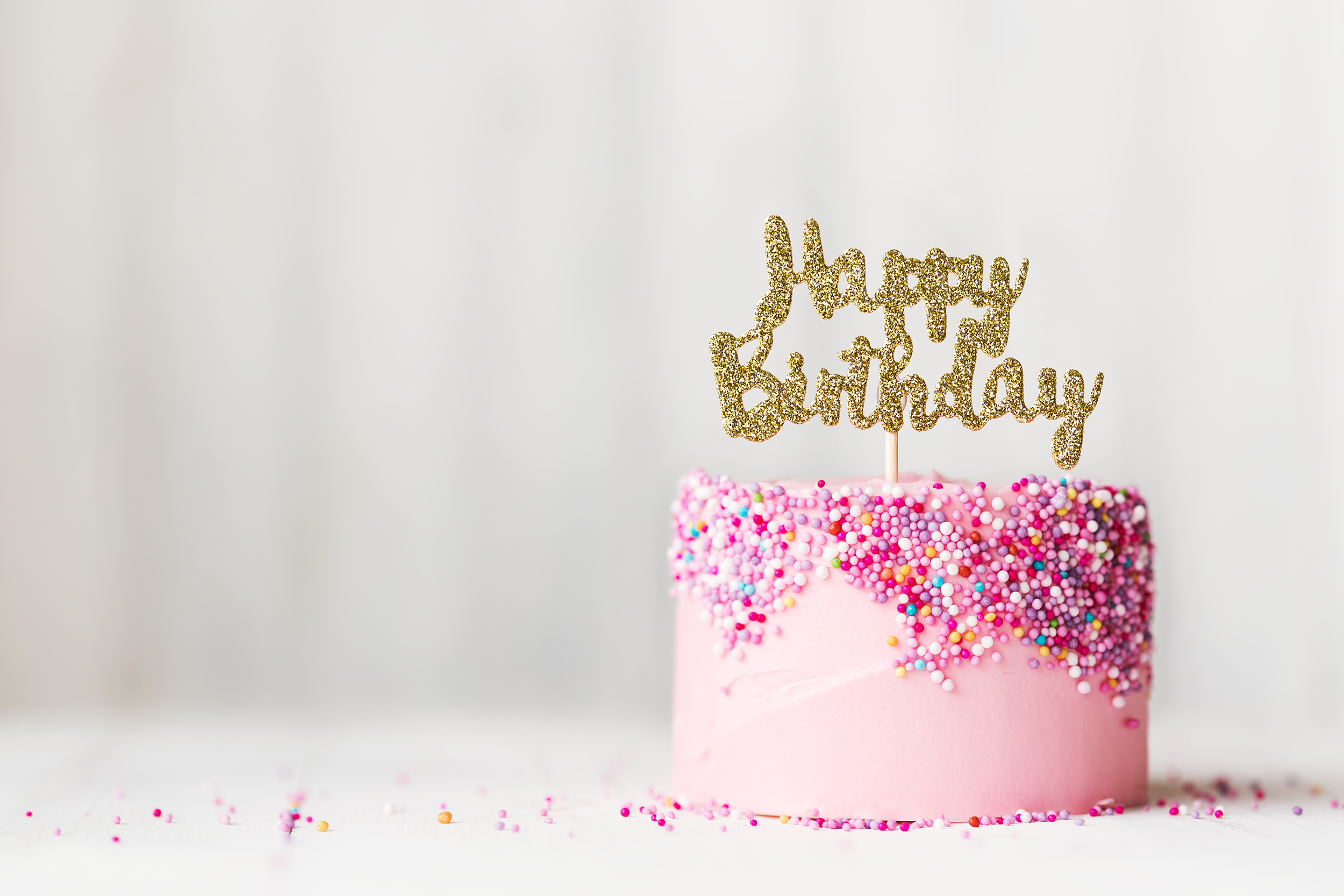 Birthday cake with a glitter cake topper