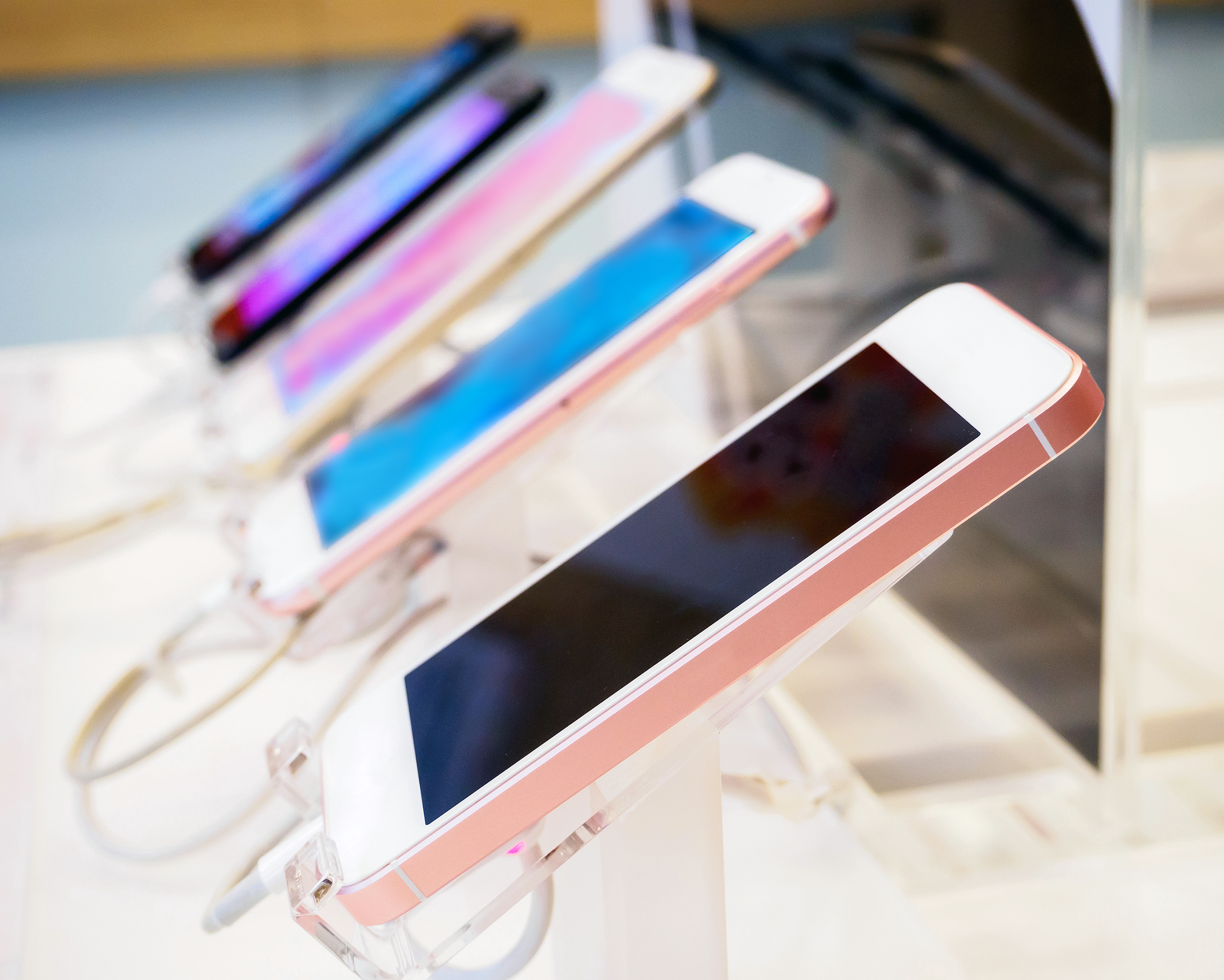 Row of cellphones in a store