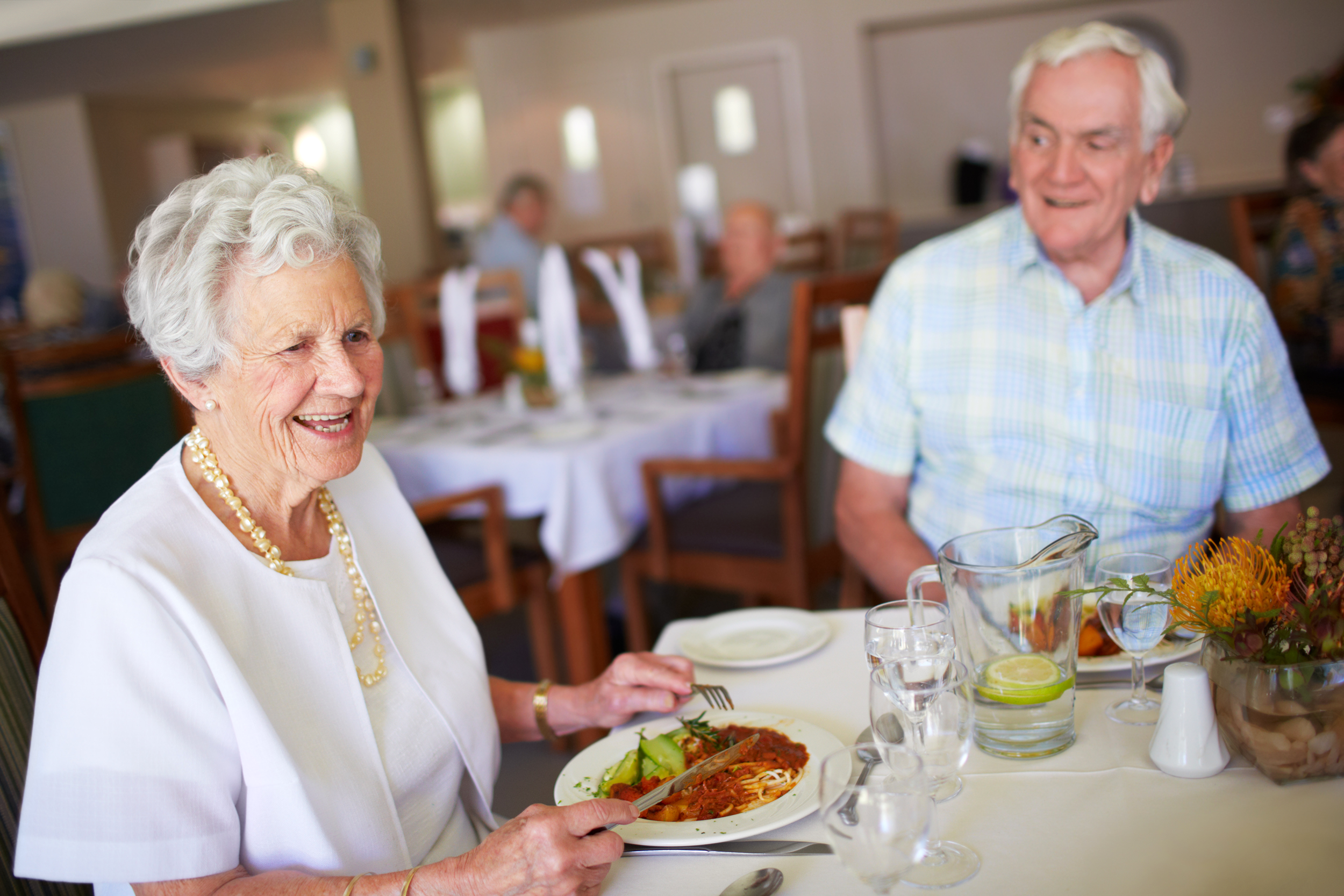 Seniors dining in a nursing home