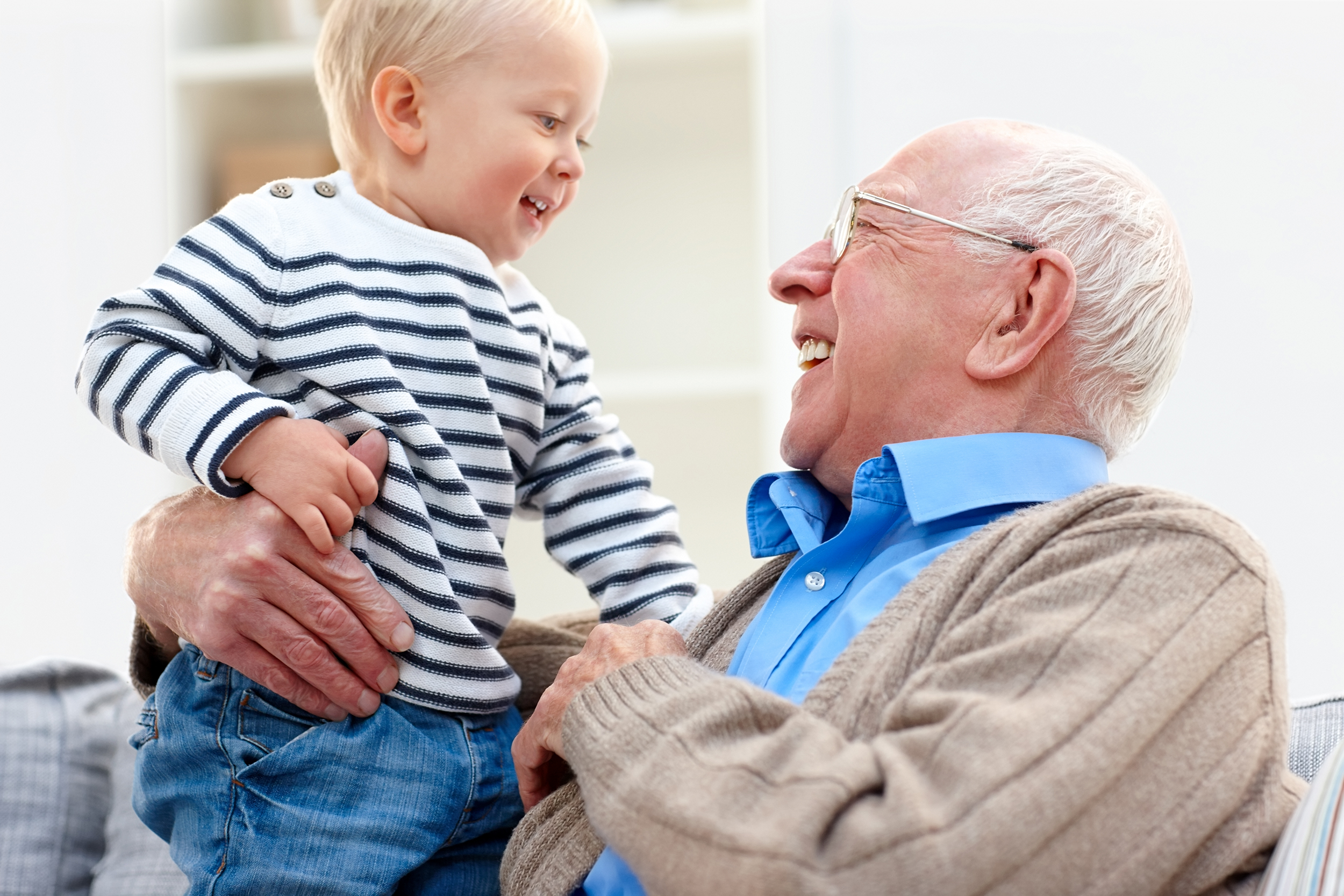Grandpa holding his grandson
